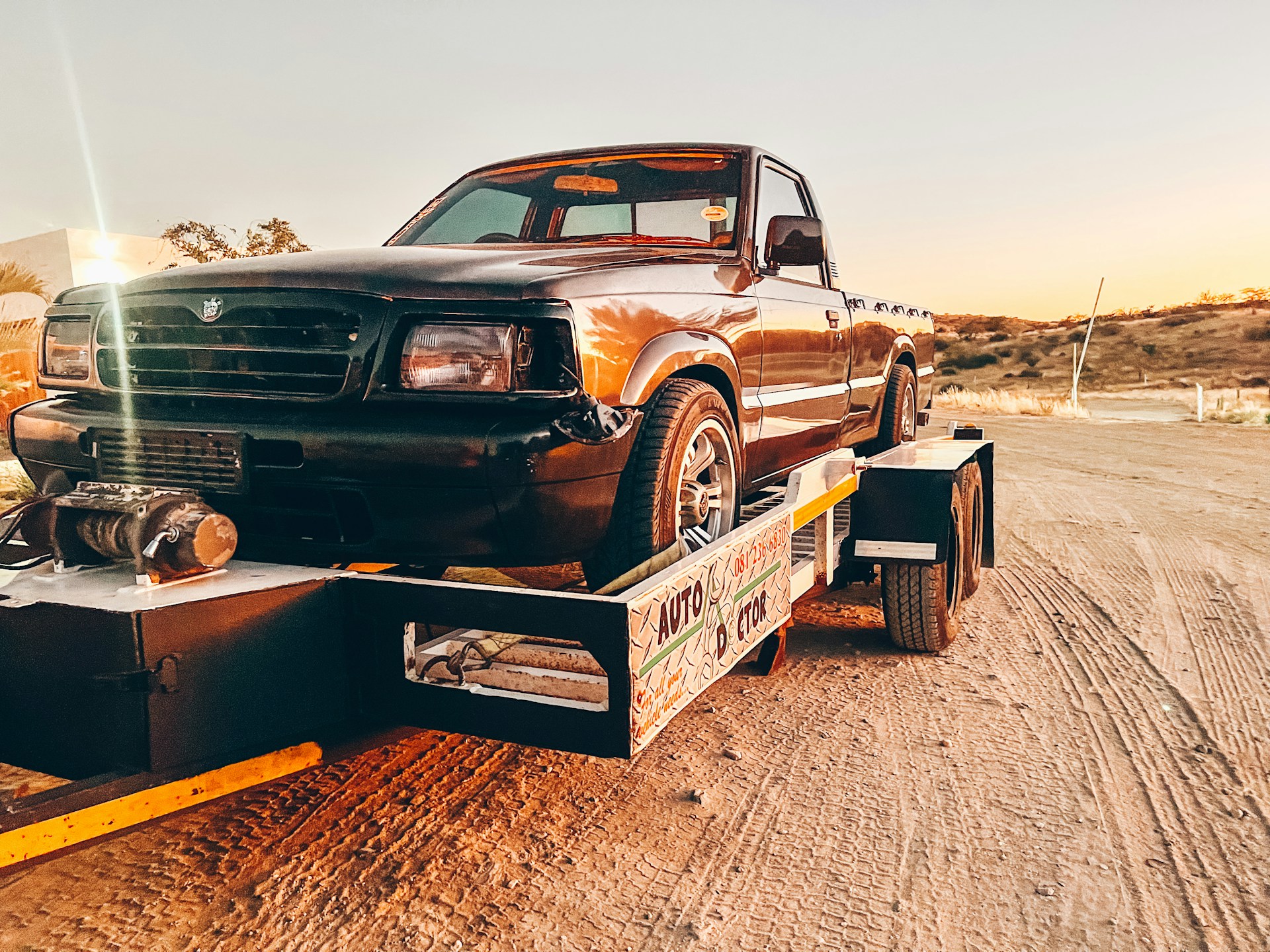 A pickup truck being towed | Source: Unsplash