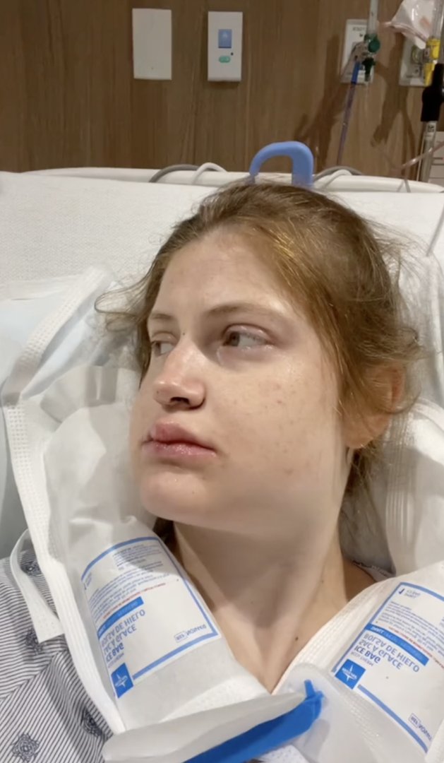 Swollen and exhausted, Virginia Elder lies in recovery shortly after her double jaw surgery. | Source: TikTok/virginiaeelder