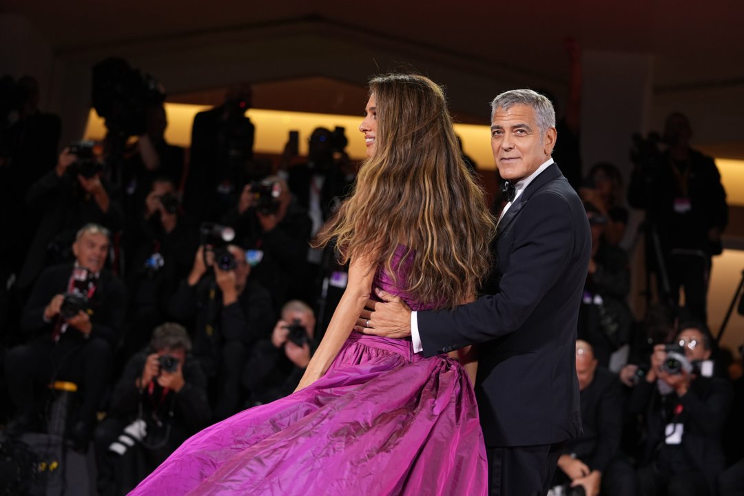Amal and George Clooney attend the red carpet of the movie 