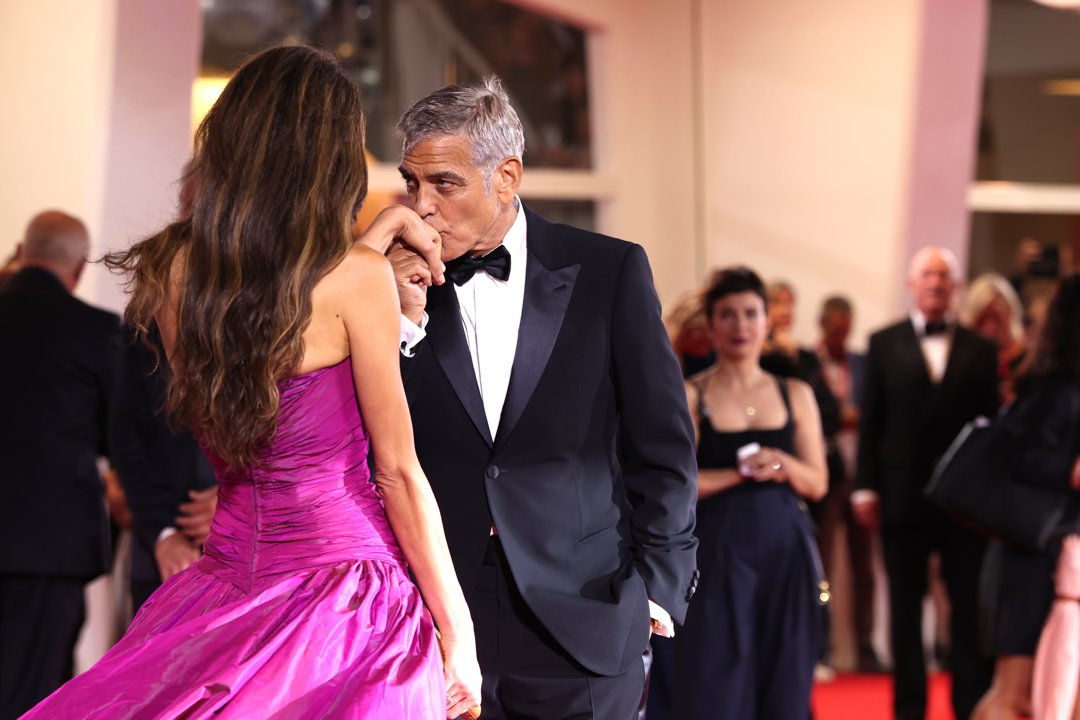 Amal and George Clooney attend the red carpet of the movie 