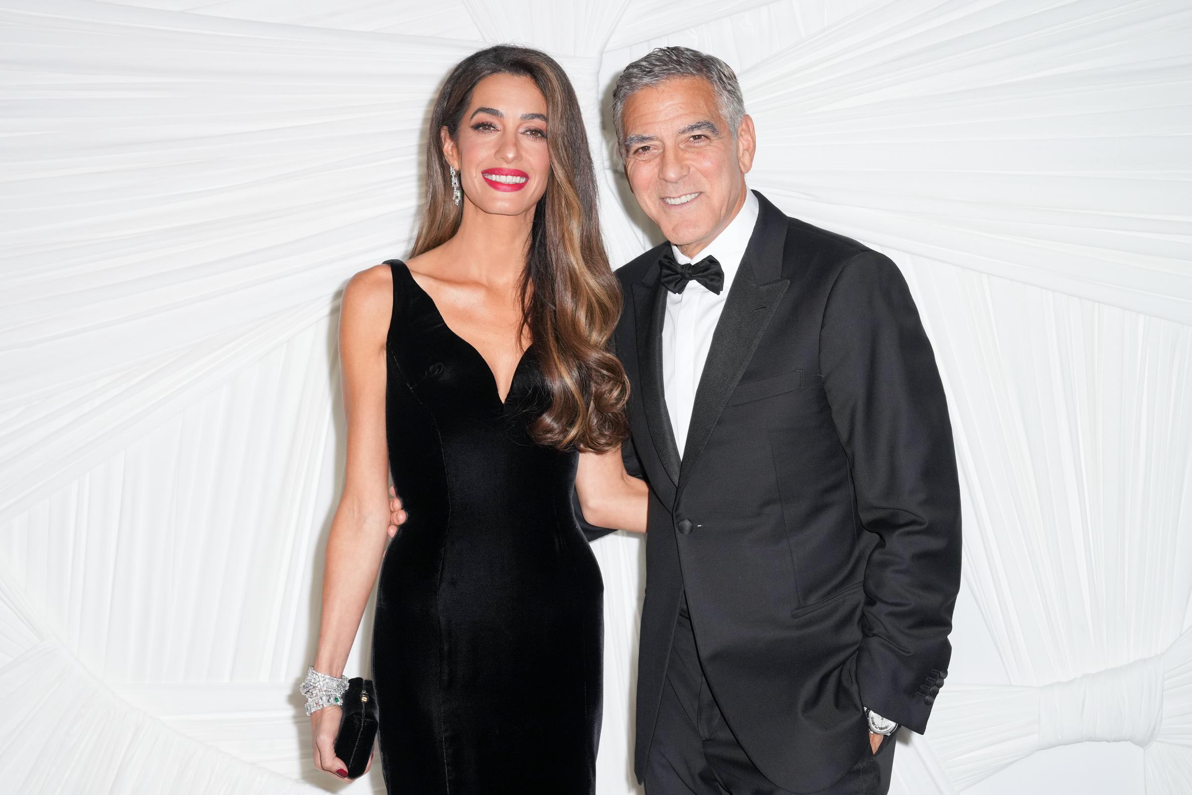 Amal and George Clooney are seen on September 26, 2024, in New York | Source: Getty Images