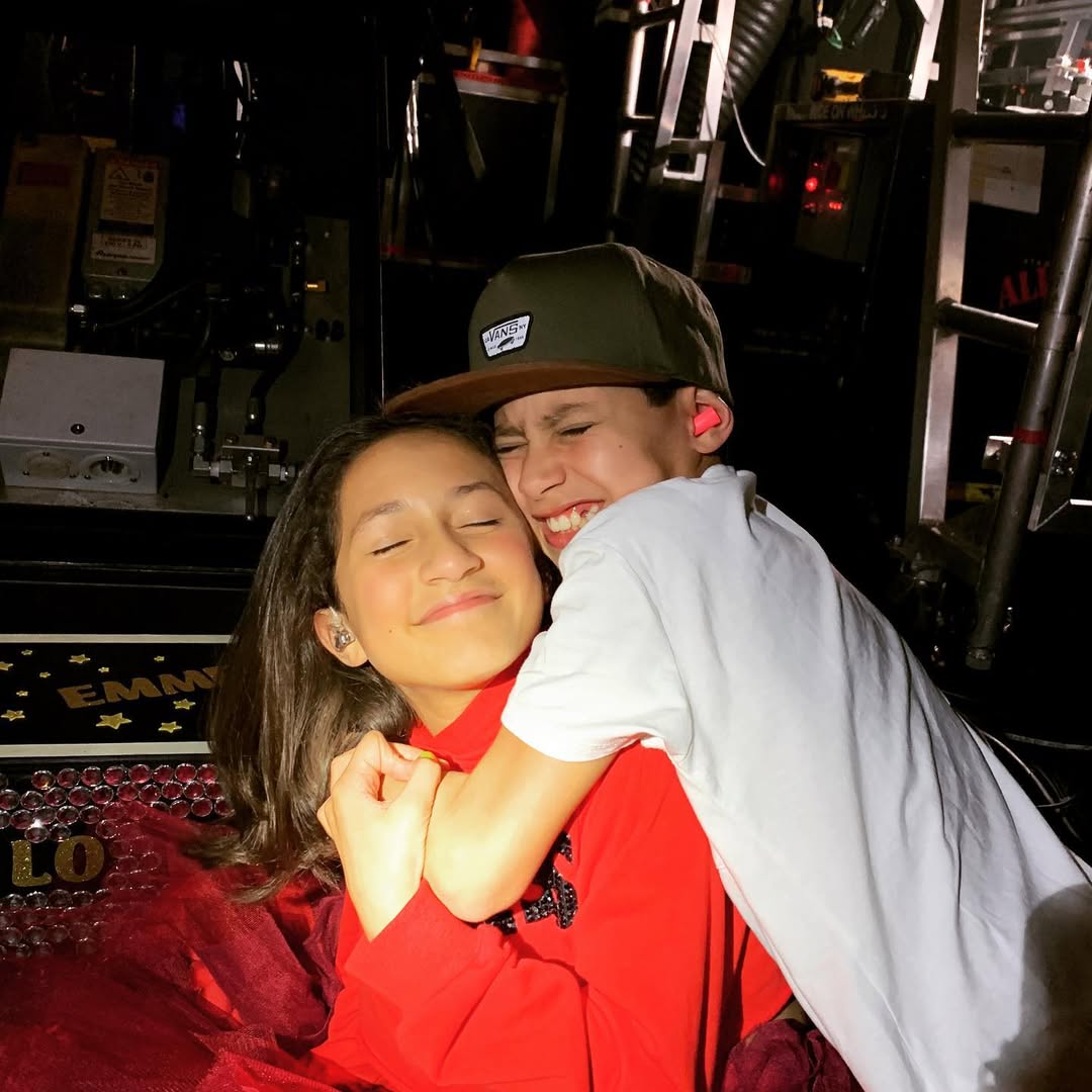 Emme and Maximilian Muniz pictured backstage during their mother's 