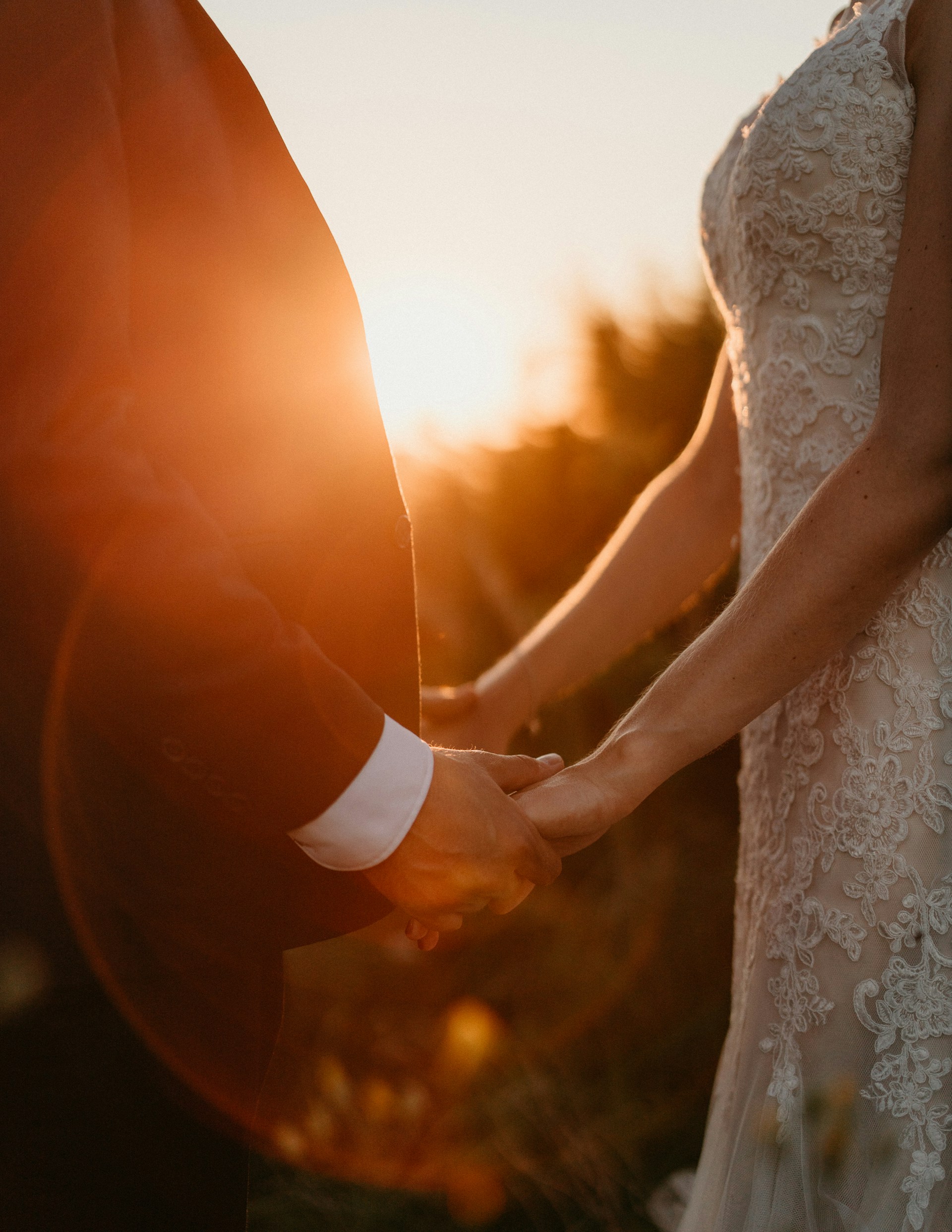 A bride and groom holding hands | Source: Unsplash