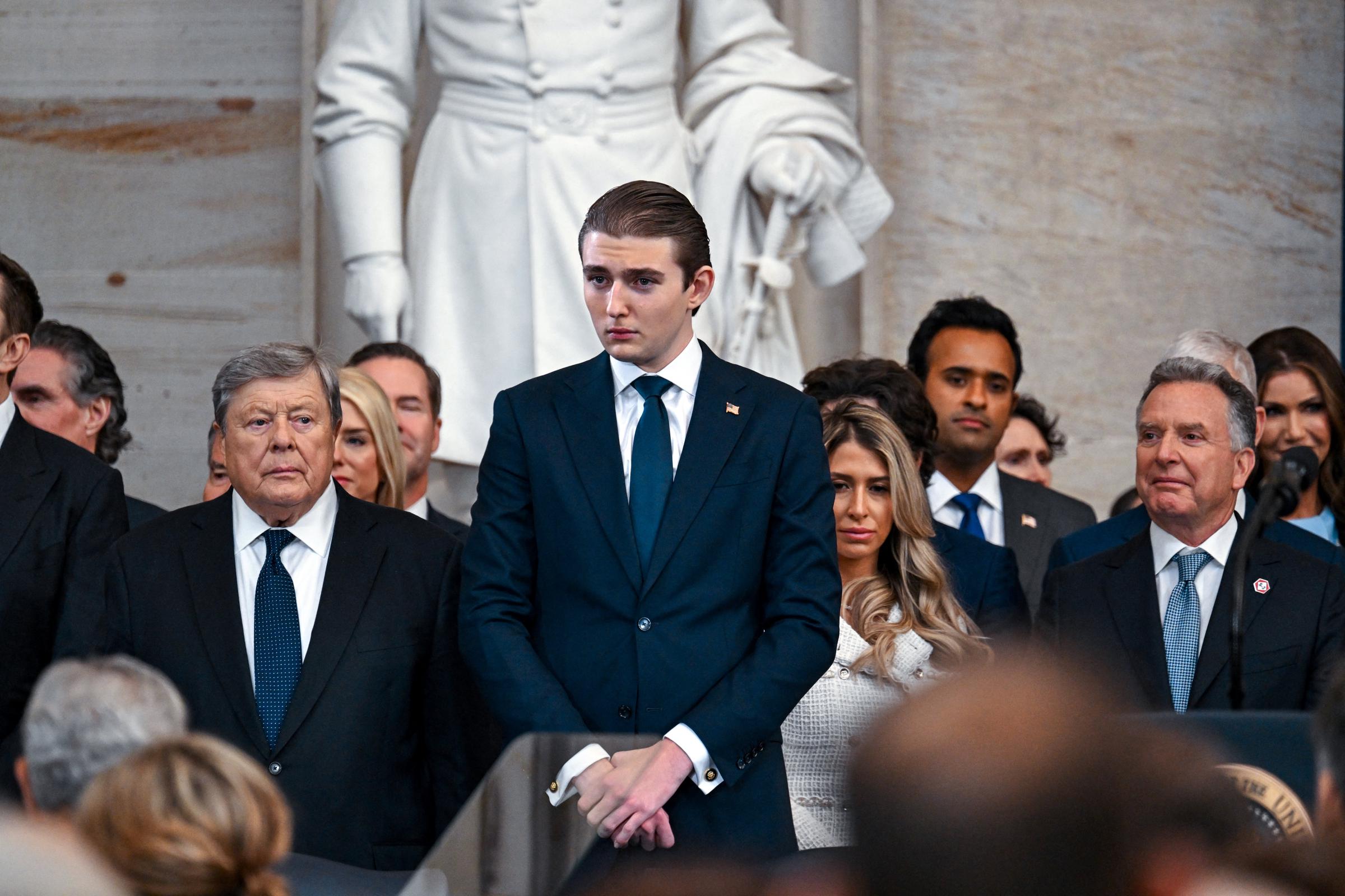 Barron Trump and his grandfather Viktor Knavs arrive for the inauguration of Donald Trump as the 47th president of the United States. | Source: Getty Images