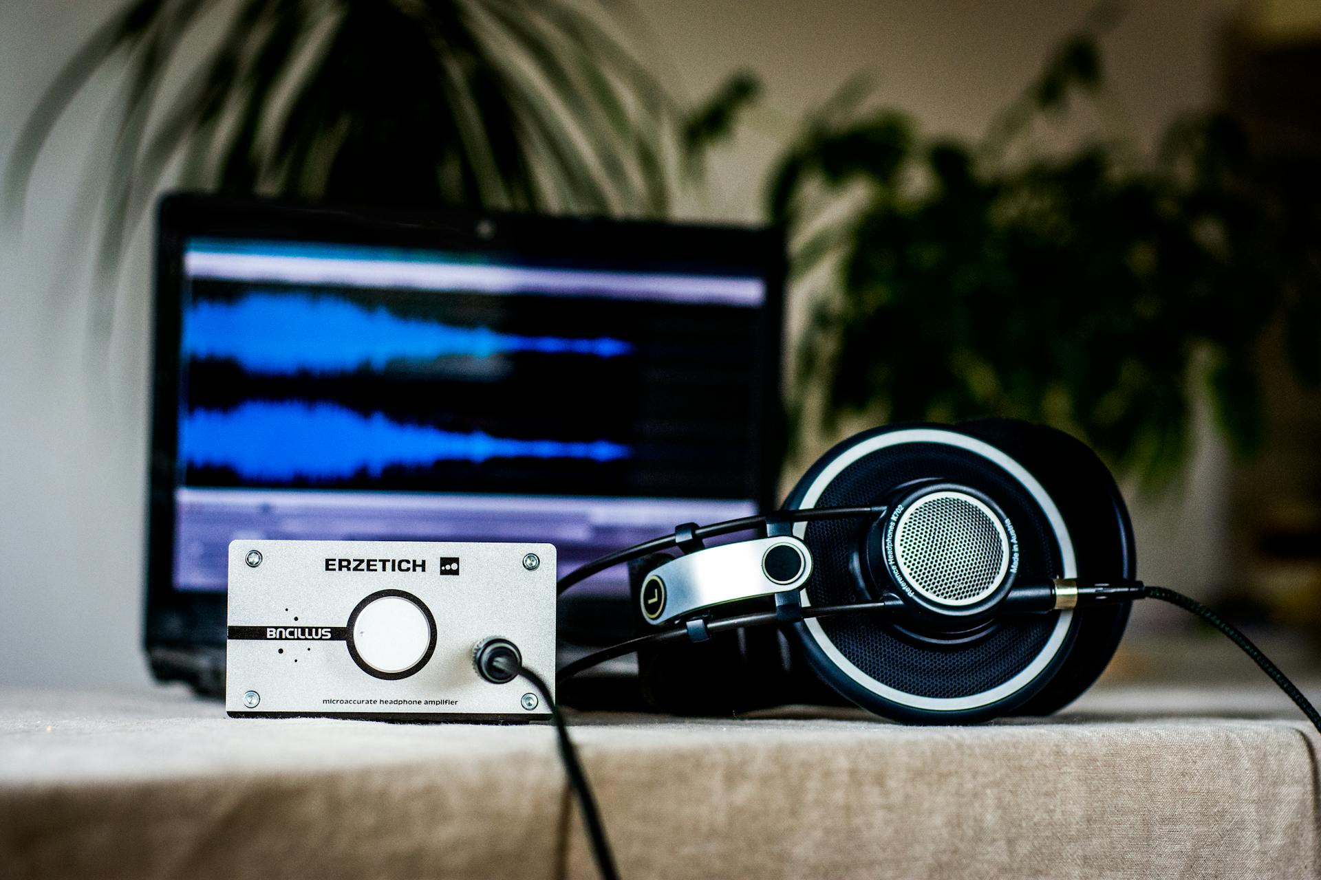 Black headset on a table | Source: Pexels