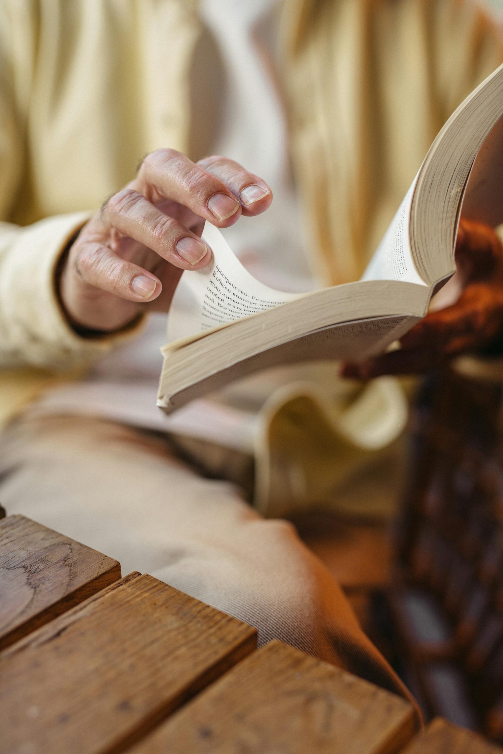 Close-up shot of a woman reading a book | Source: Pexels