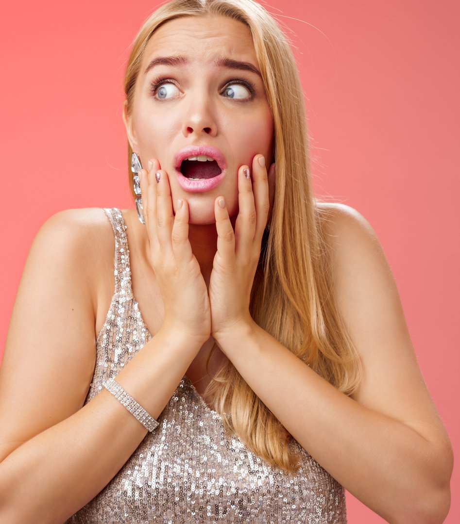 A startled woman | Source: Freepik