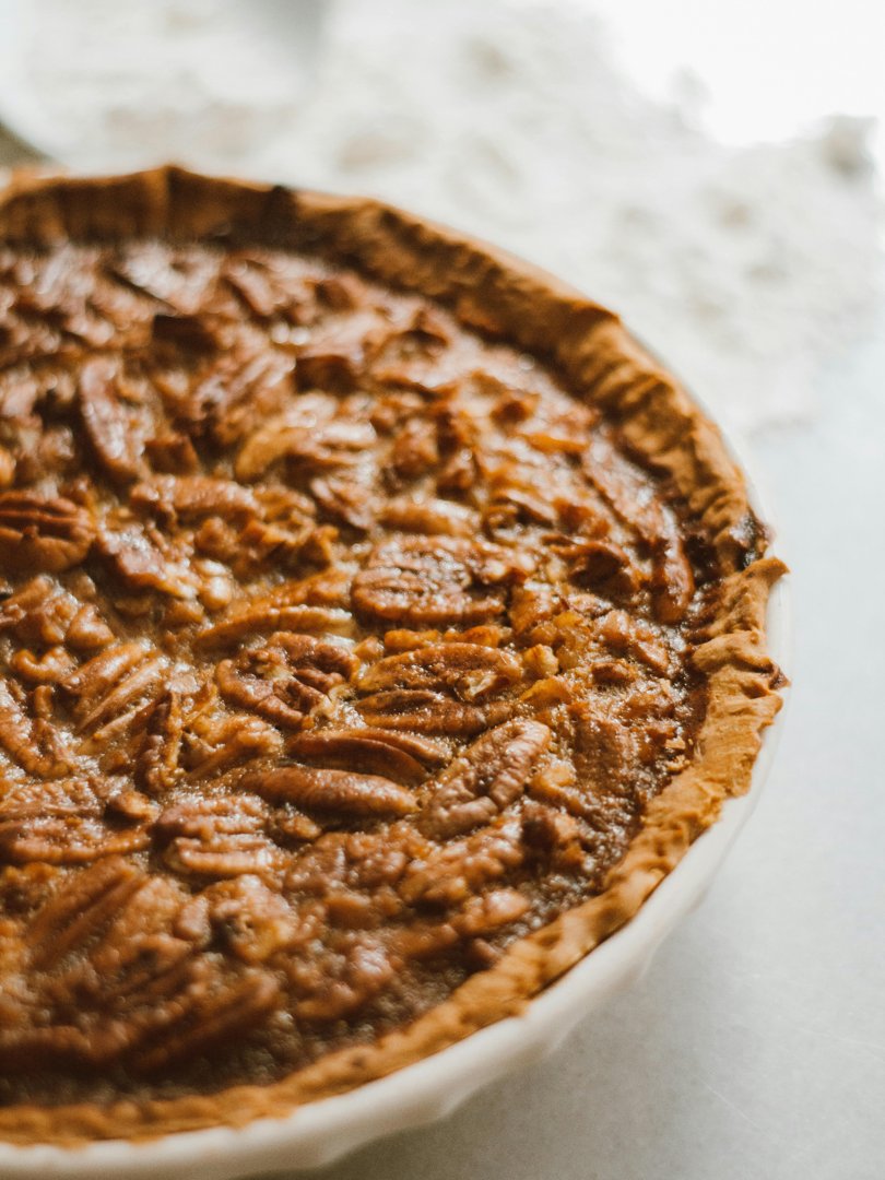 A pecan pie on a kitchen counter | Source: Pexels