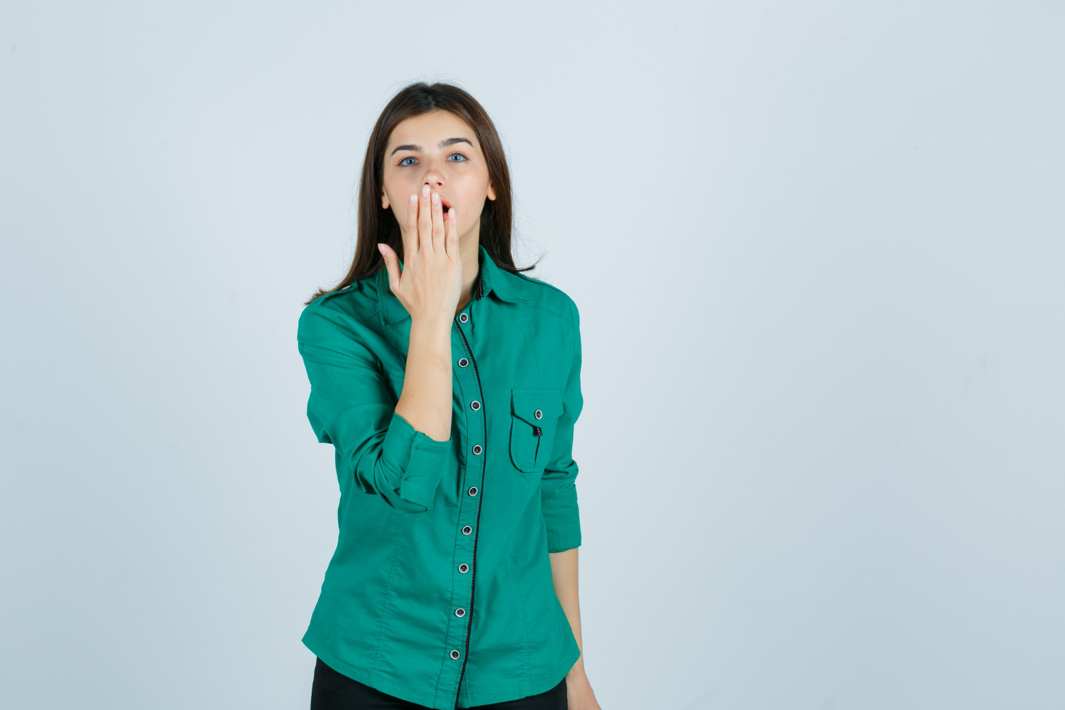 A startled woman | Source: Freepik