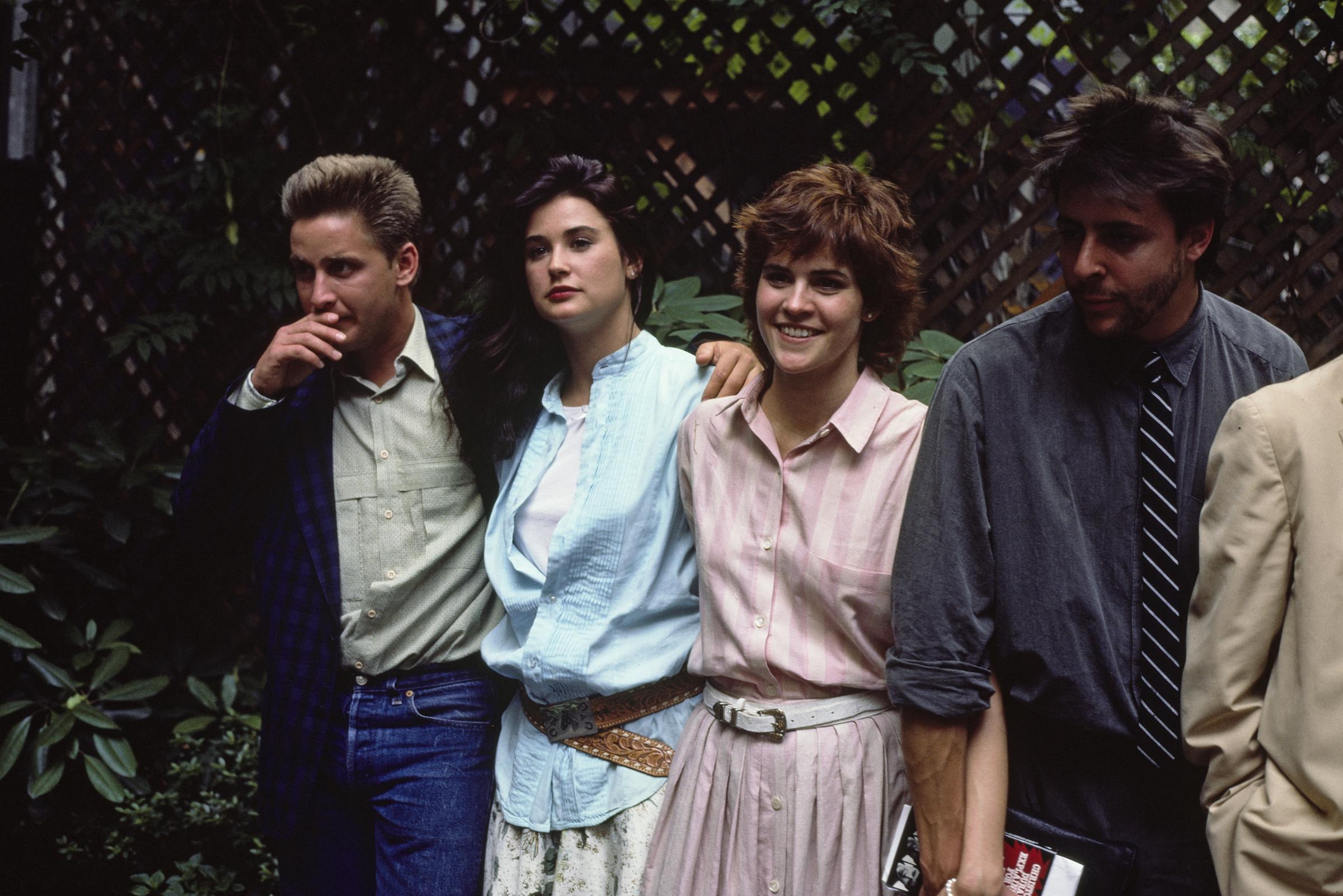 Emilio Estevez, Demi Moore, the actress, and Judd Nelson pictured during a promotional event for