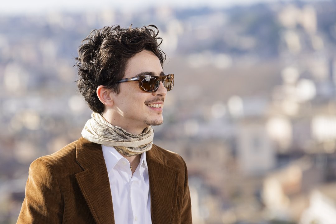 Timothée Chalamet’s brown curly locks were on full display once again as he attended the photocall for the movie 