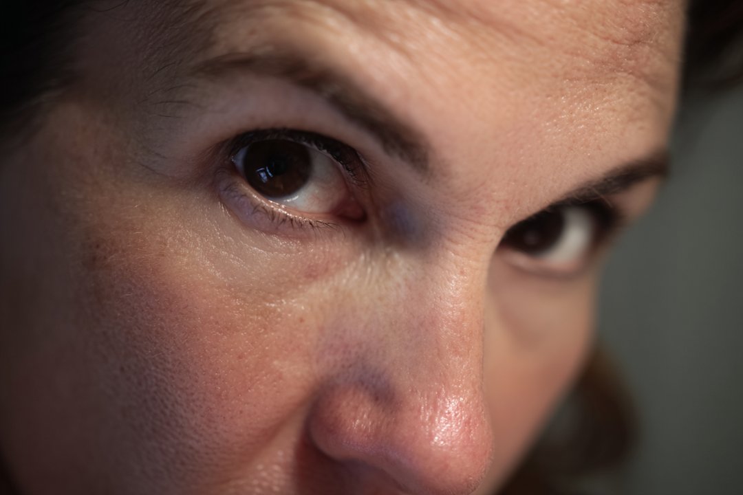 A close-up shot of a woman's eyes | Source: Midjourney