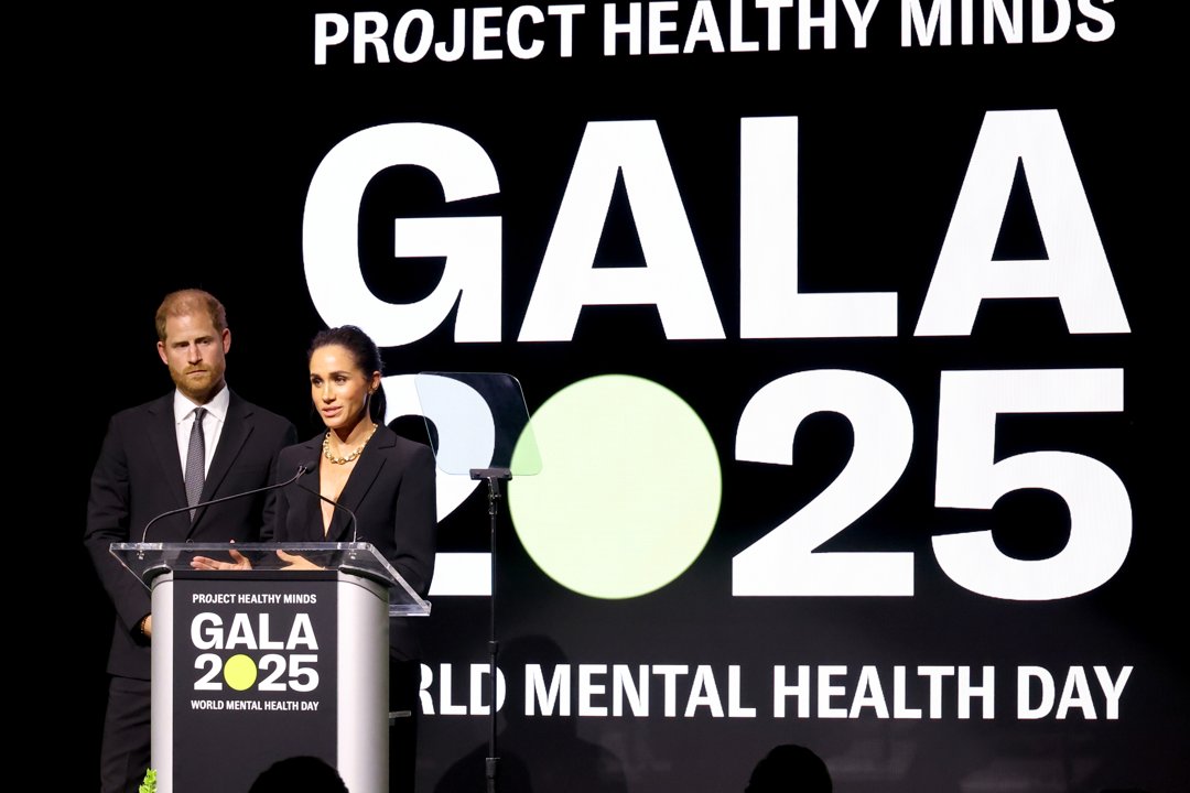 Meghan Markle and Prince Harry speak onstage the Project Healthy Minds World Mental Health Day Gala in New York City on October 9, 2025 | Source: Getty Images