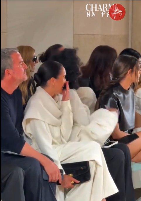 The moment Meghan Markle giggles at something, from a video post dated October 7, 2025 | Source: TikTok/TheStandard