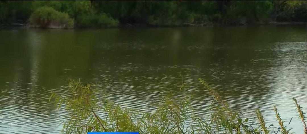 A view of the Brazos River in Johnson County, where the two boys drowned, from a video dated October 8, 2025 | Source: YouTube/@CBSDFW