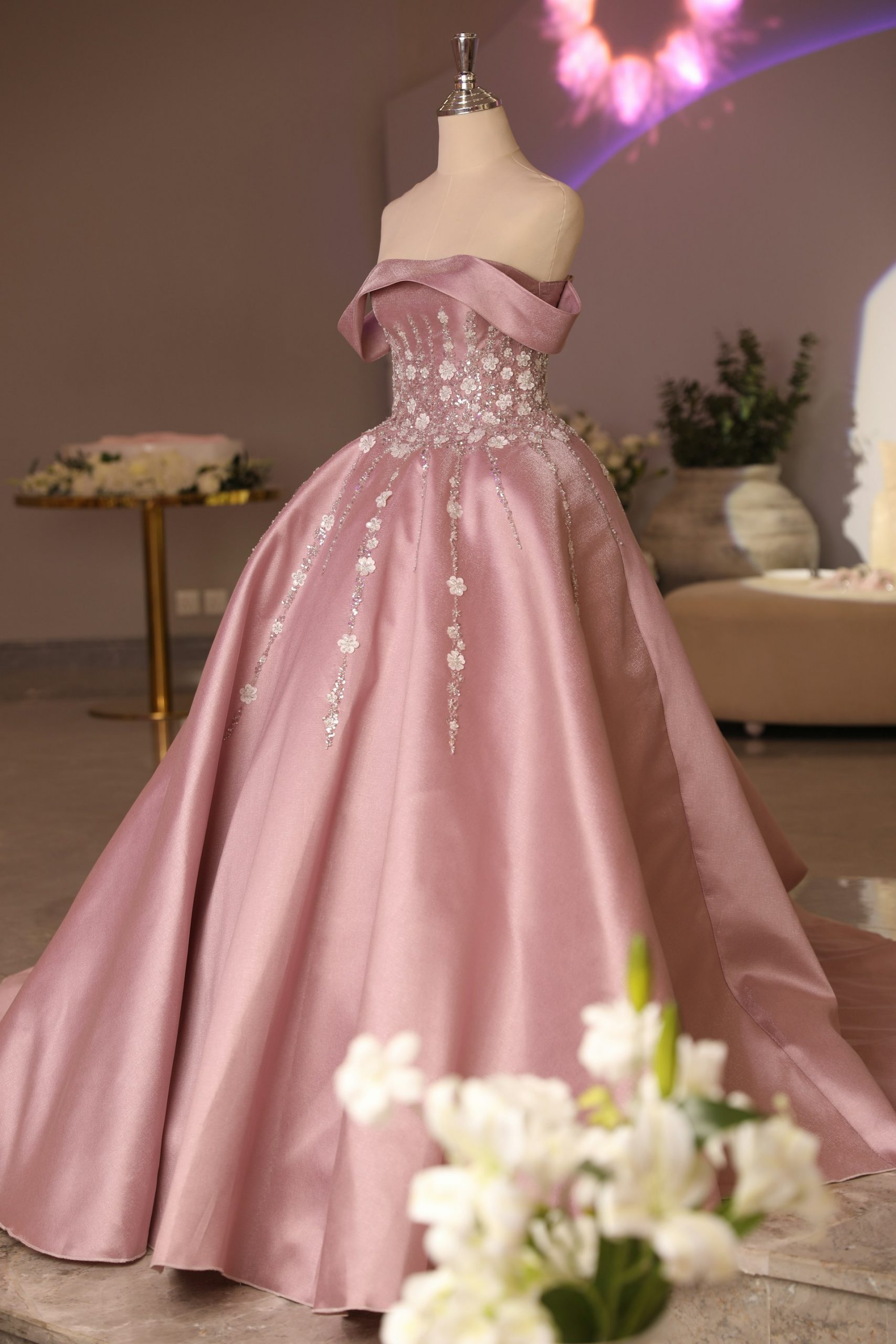 A pink satin dress on a mannequin | Source: Unsplash