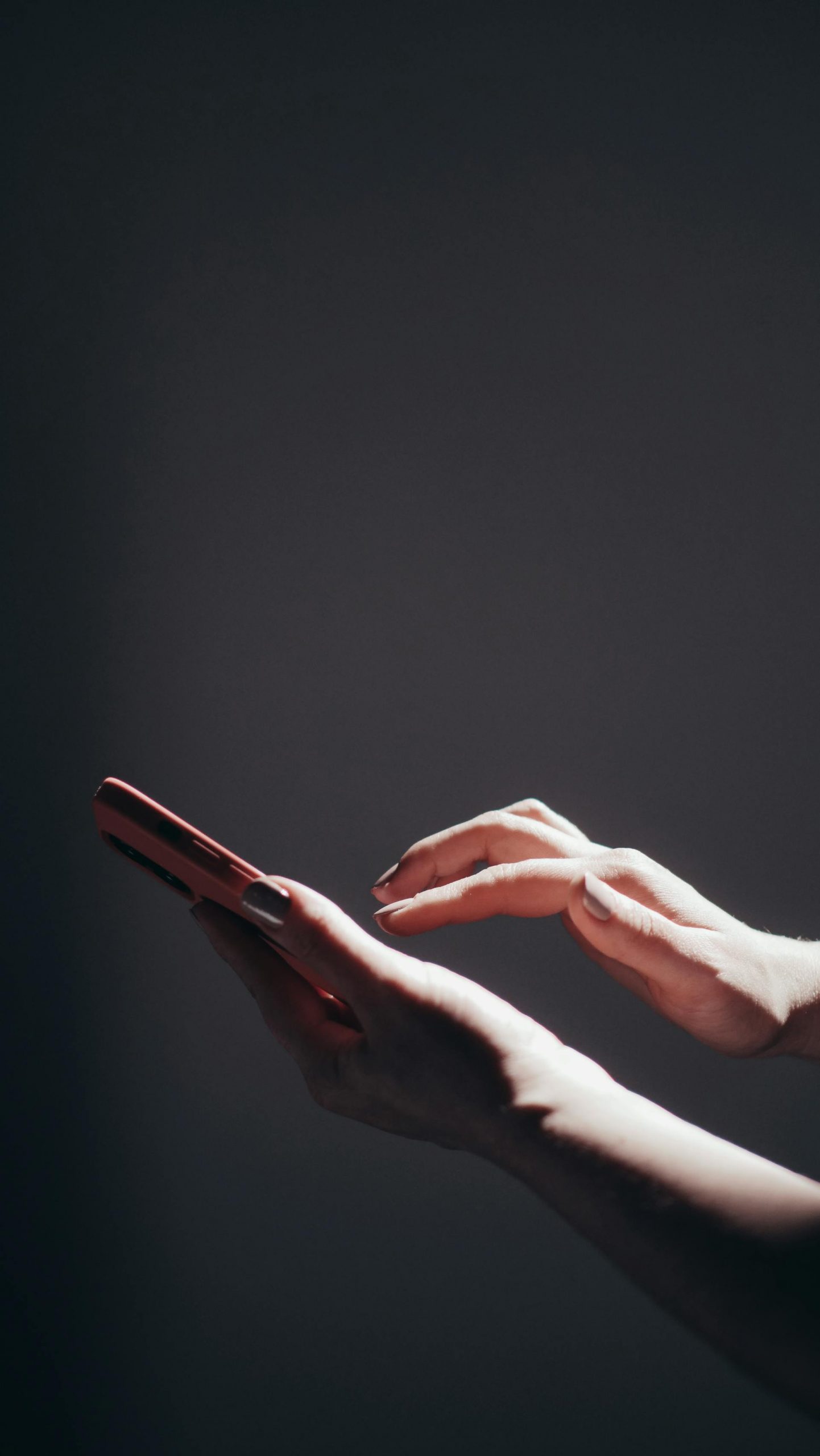 A woman using a phone | Source: Pexels