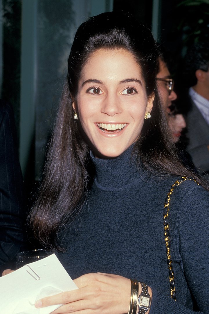 Radiating excitement, Jami Gertz arrived at a Beverly Hills dinner party in a chic navy turtleneck, her sleek hair and glowing smile stealing the spotlight.