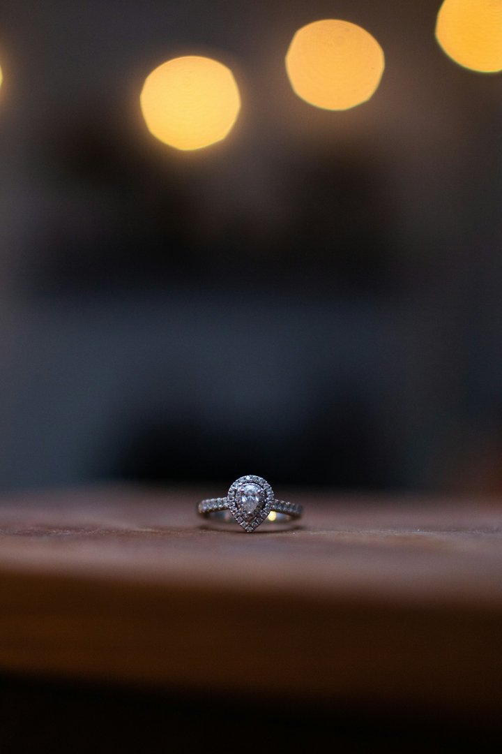 A wedding ring lying on a table | Source: Unsplash
