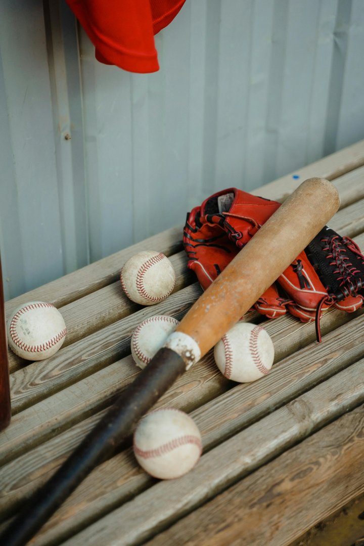 Baseball gear on a bench | Source: Pexels
