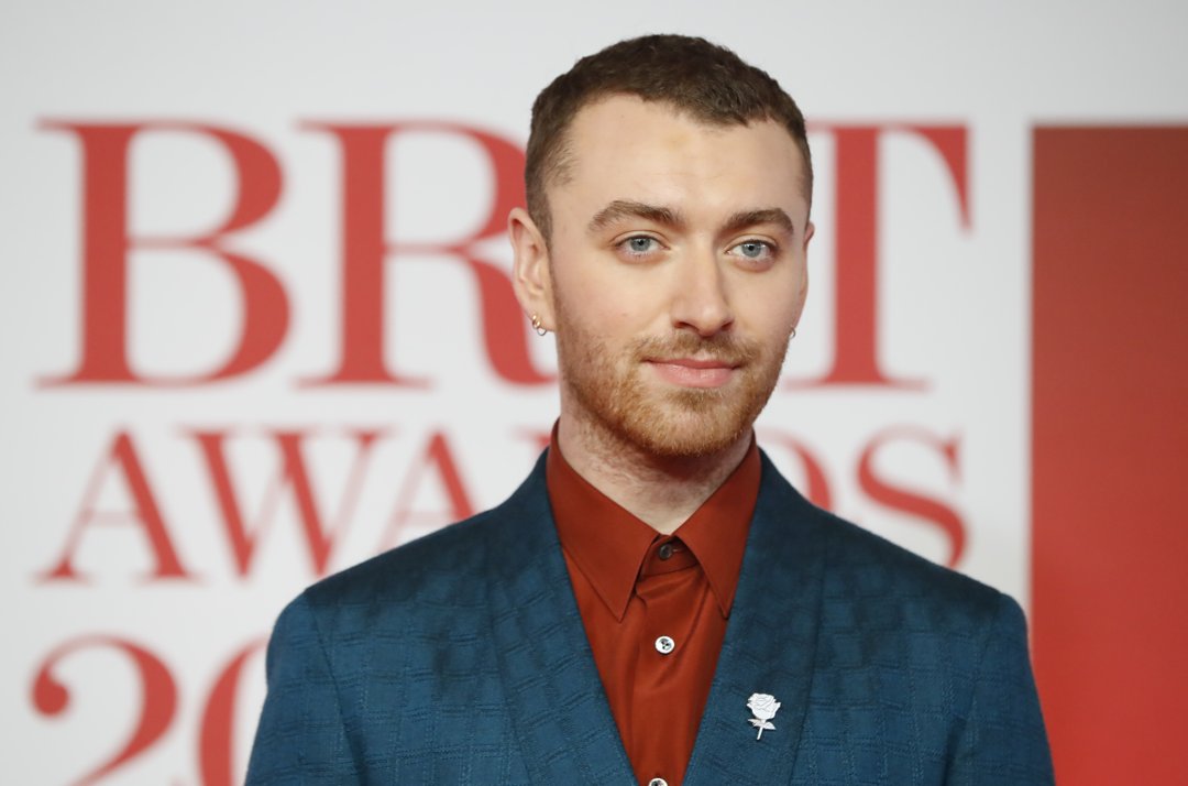 Sam Smith poses on the red carpet on arrival for the BRIT Awards on February 21, 2018 | Source: Getty Images