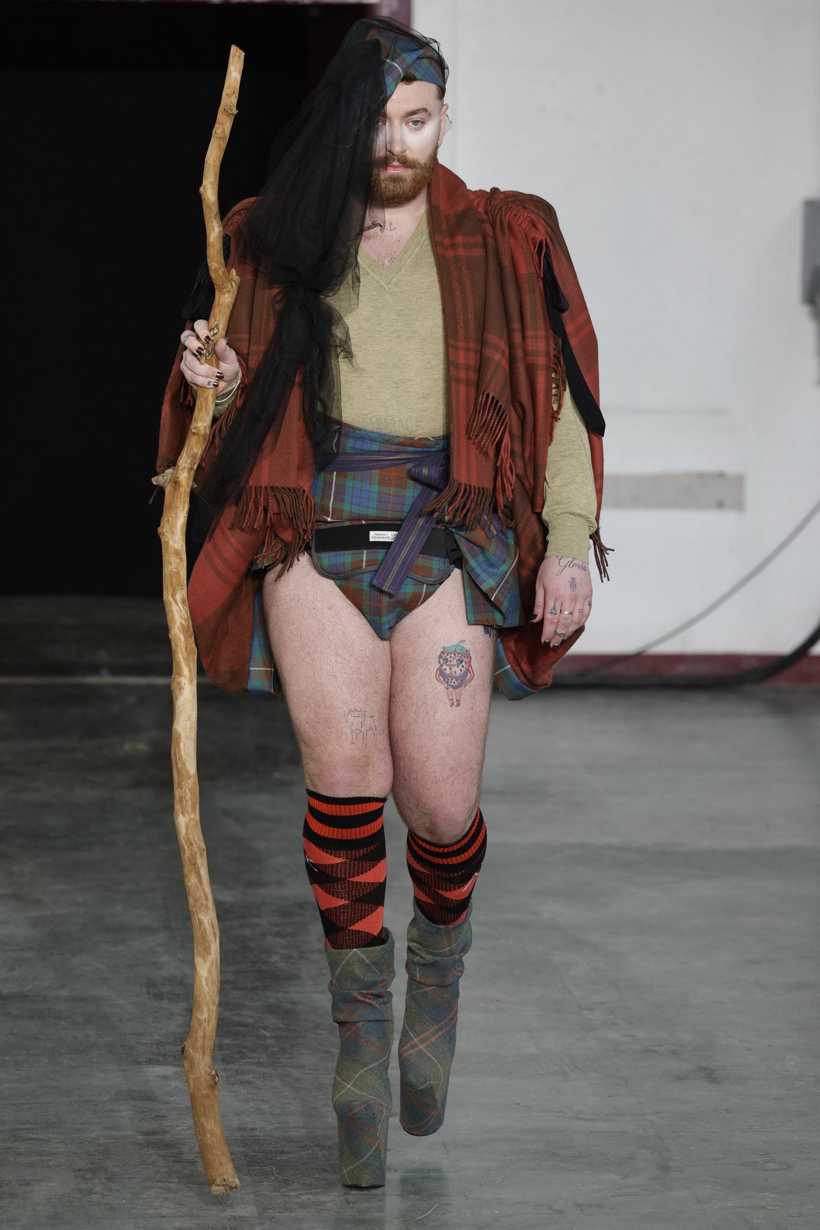 Sam Smith presents a creation by Vivienne Westwood for the Women Ready-to-wear Fall-Winter 2024/2025 collection as part of the Paris Fashion Week on March 2, 2024 | Source: Getty Images