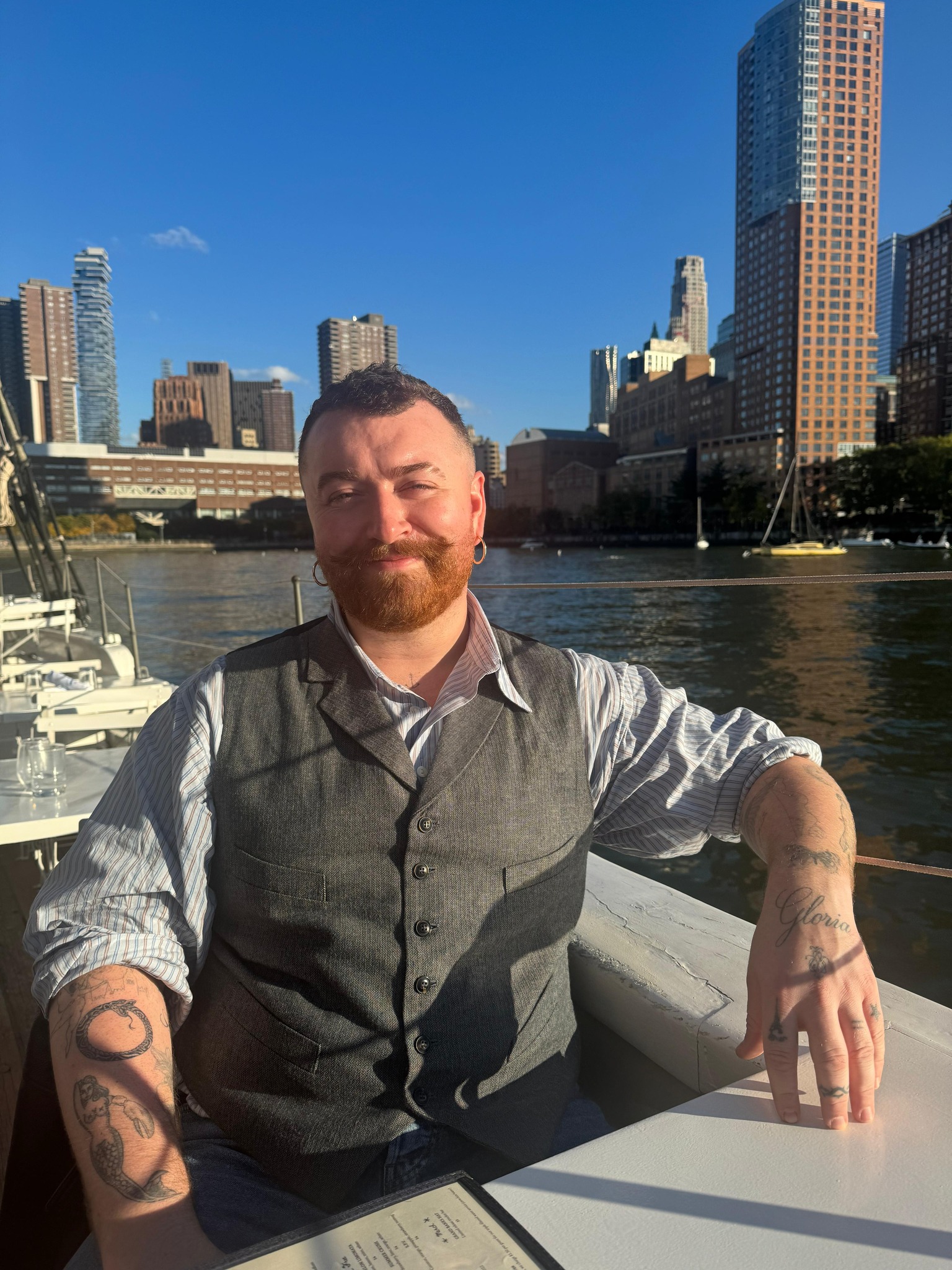 Sam Smith poses for a picture, dated November 3, 2025 | Source: Facebook/samsmithworld