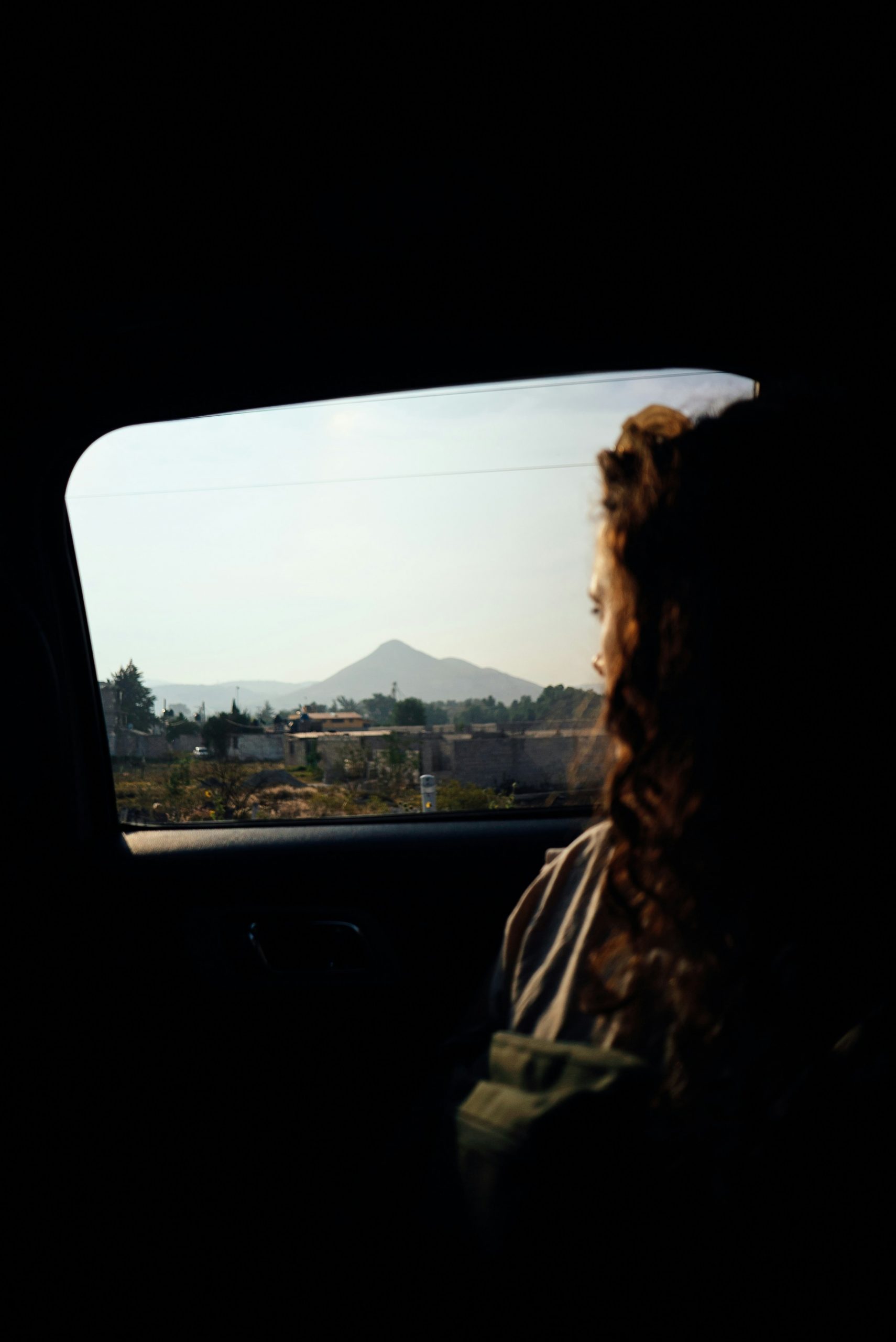 A person looking out of a car window | Source: Unsplash