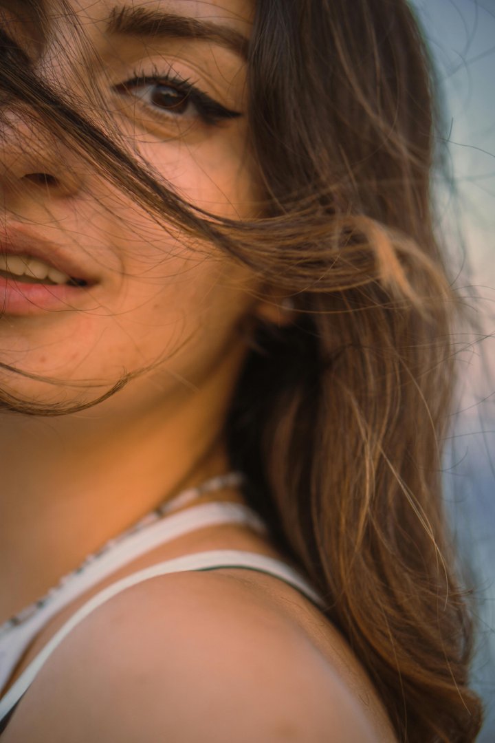 A smiling young woman | Source: Pexels