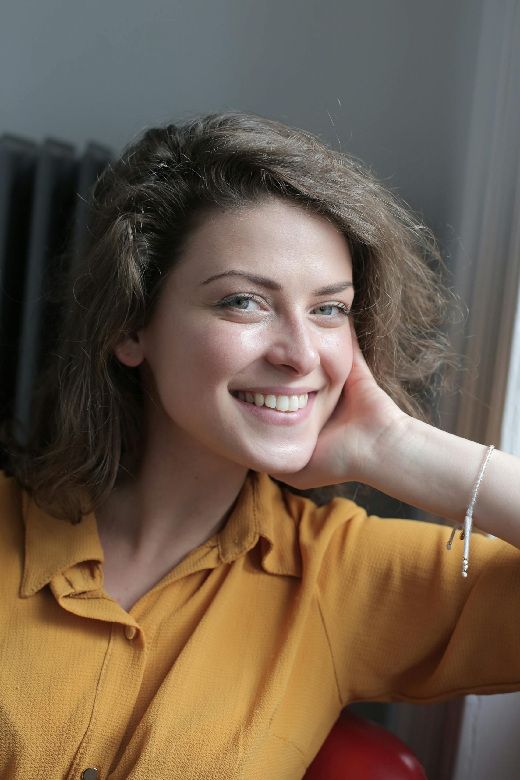 A woman smiling | Source: Pexels