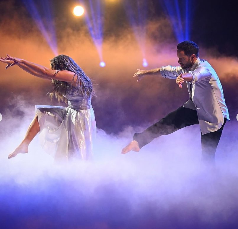 Danielle Fishel and Pasha Pashkov perform onstage, seen in a post dated, November 5, 2025 | Source: Instagram/dancingwiththestars