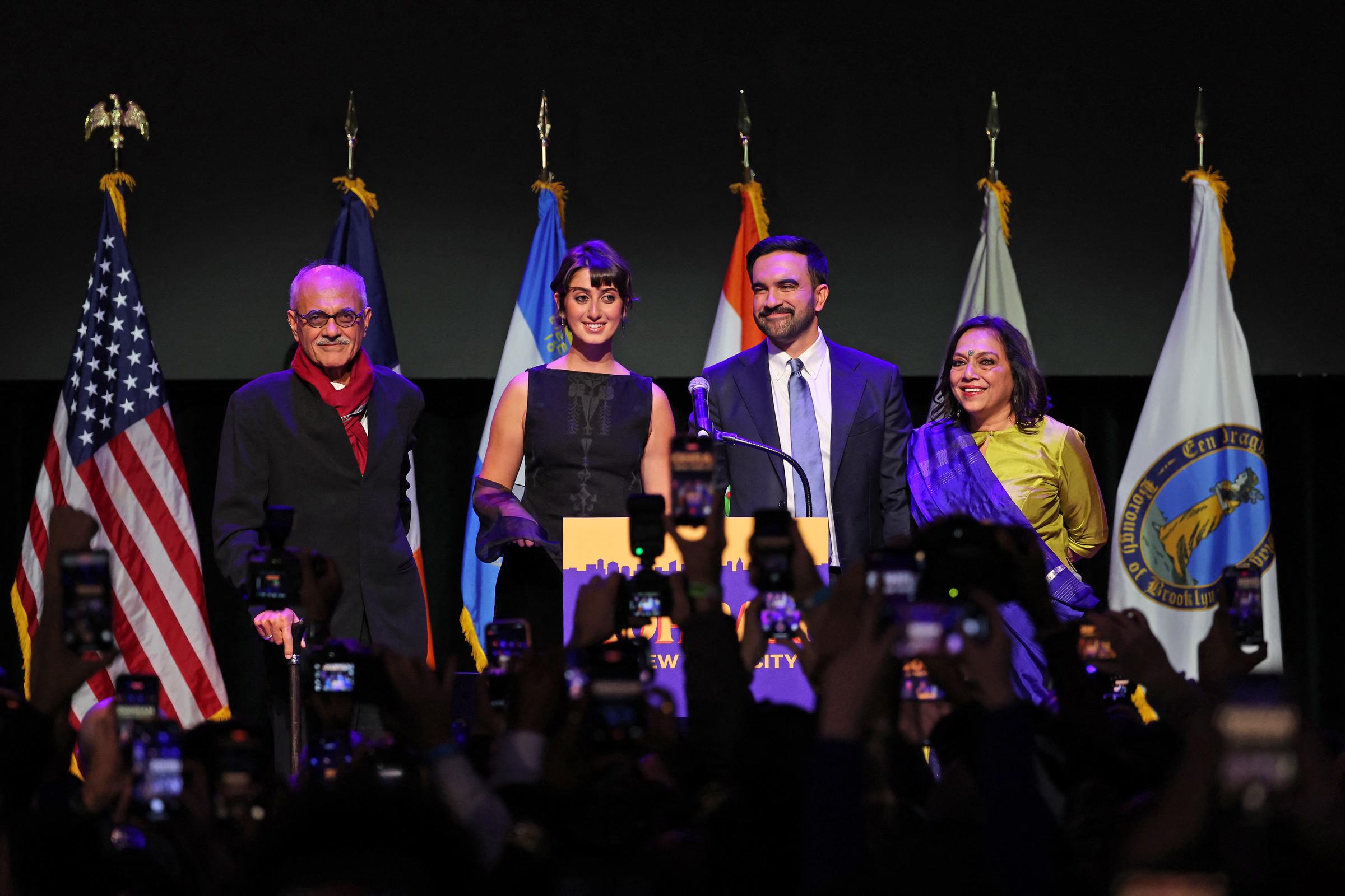 Zohran Mamdani celebrates alongside his wife Rama Duwaji, his parents Mahmood and Mira Nair during an election night event at the Brooklyn Paramount Theater in New York on November 4, 2025. | Source: Getty Images
