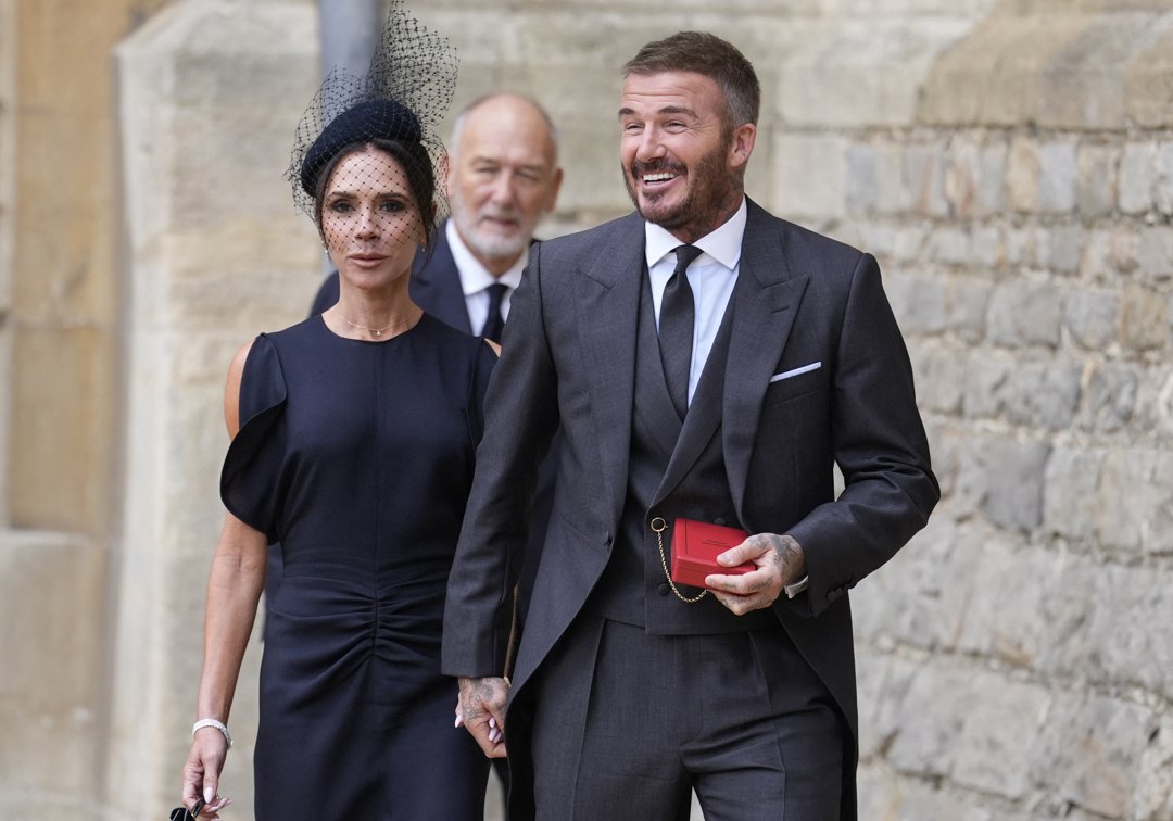 Lady Victoria Beckham, Sir David Beckham, and Ted Beckham at Windsor Castle for David's knighting by the King of England in Windsor, England on November 4, 2025. | Source: Getty Images