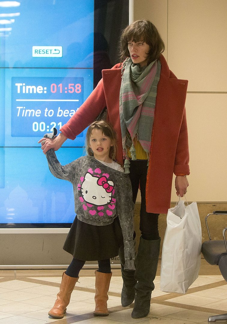 Milla Jovovich, 37, and Ever Anderson, 5, were seen at Los Angeles International Airport on March 18, 2013, in Los Angeles, California.