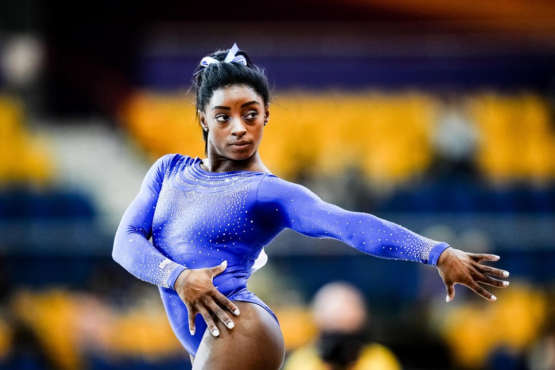 Biles strikes a powerful pose during floor qualification at the Artistic FIG Gymnastics World Championships on October 27, 2018, at the Aspire Dome in Doha, Qatar. With unmatched precision and presence, the 21-year-old delivered yet another commanding performance on the world stage.