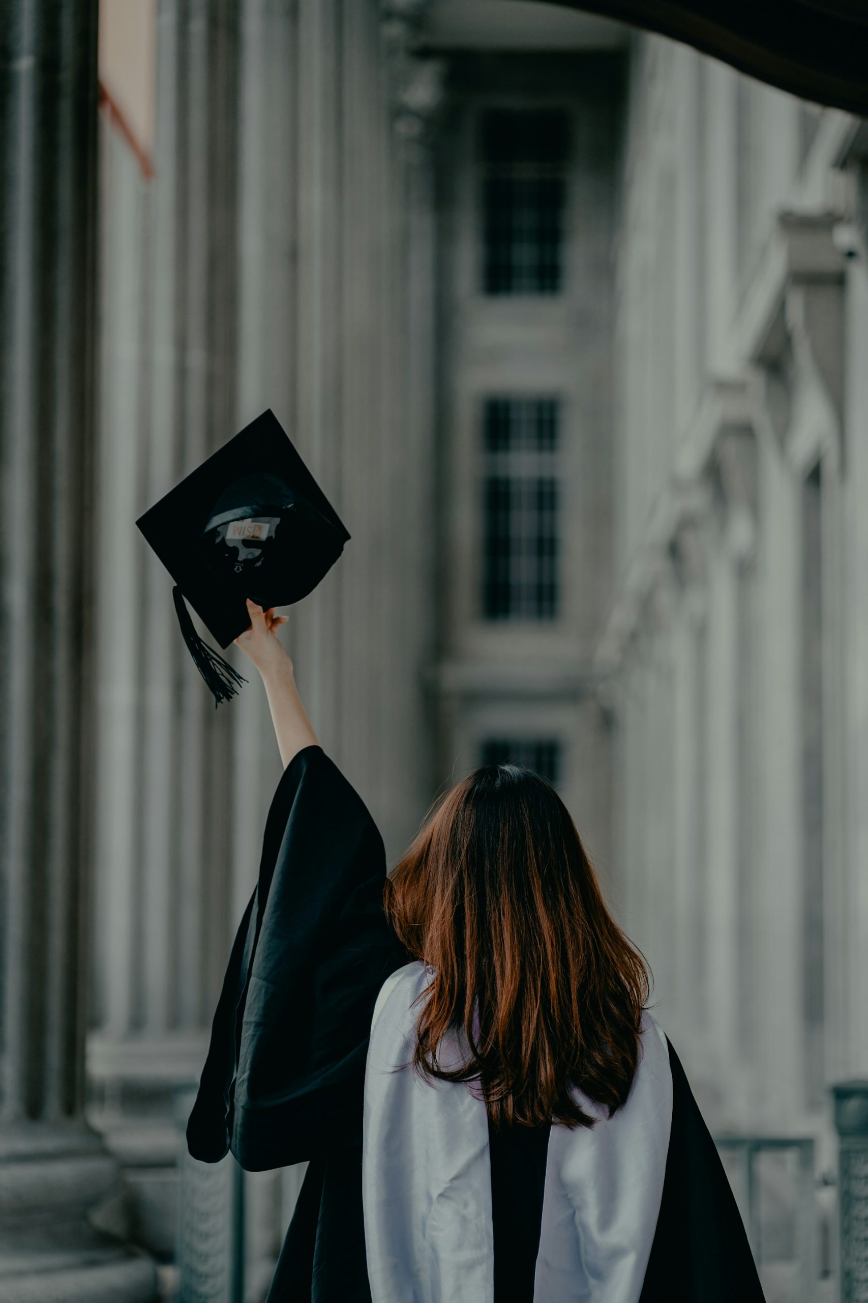 A woman at her graduation ceremony | Source: Unsplash