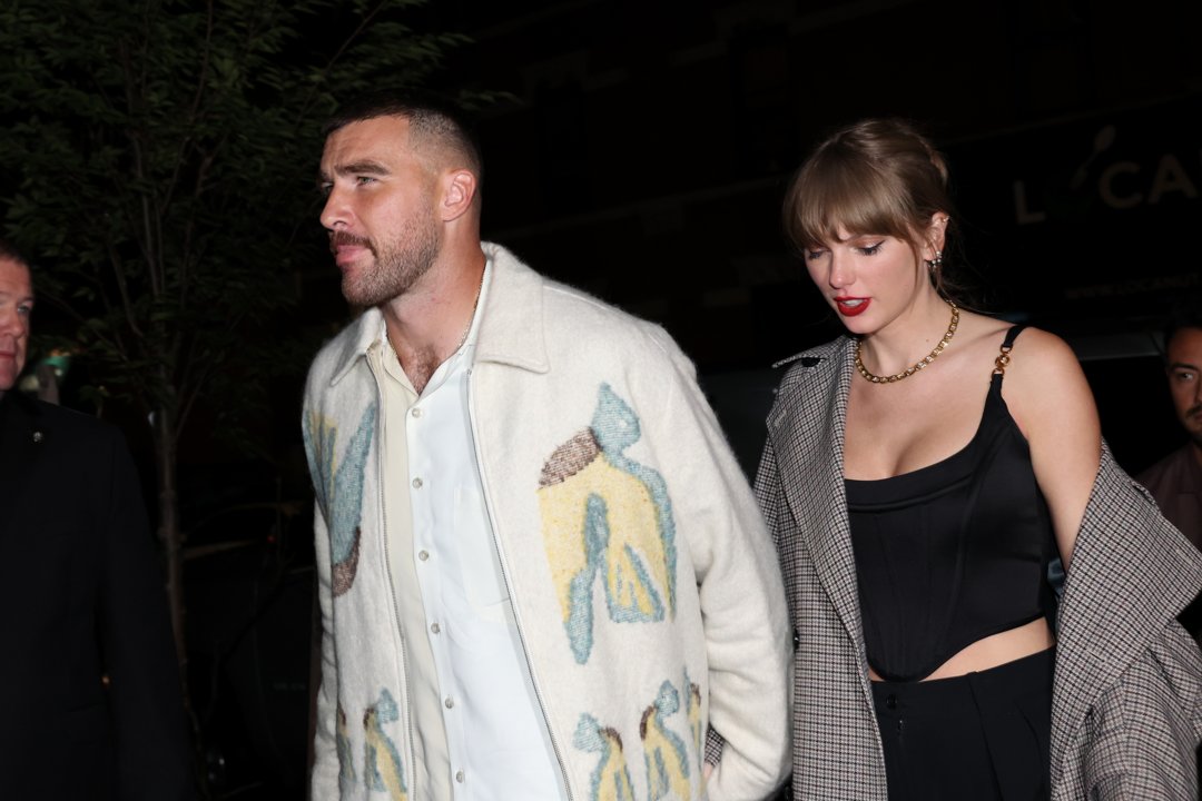 Travis Kelce and Taylor Swift at CATCH Steak on October 14, 2023, in New York. | Source: Getty Images