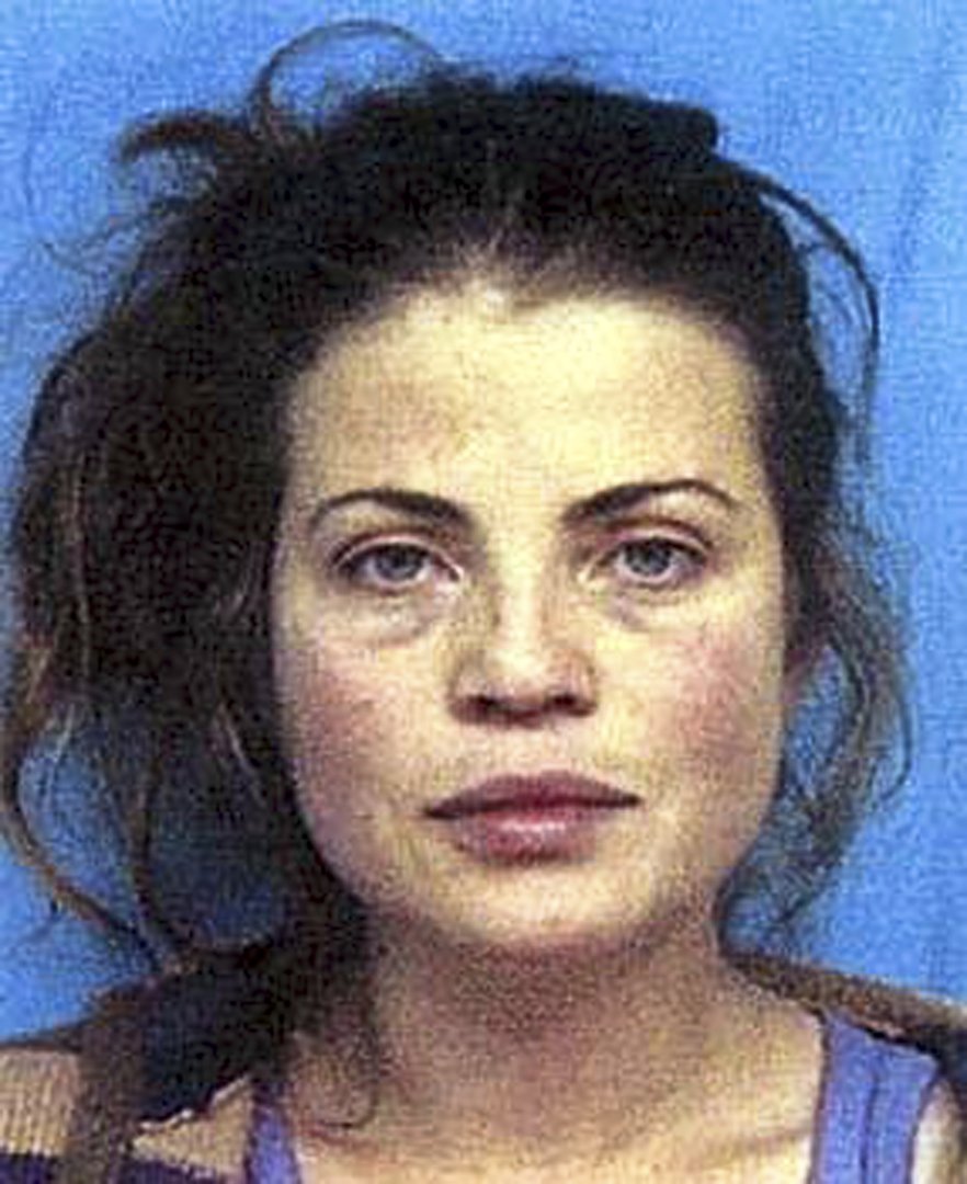 Yasmine Bleeth in a mug shot following her arrest for cocaine possession in Romulus, Michigan, on September 12, 2001 | Source: Getty Images