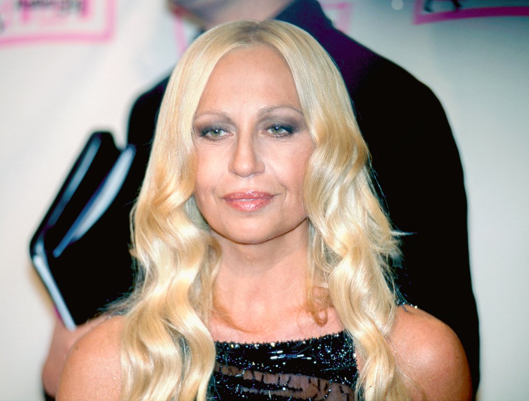 Donatella Versace, 42, attended the MTV Awards on January 13, 1998, in Milan, Italy. Her face showed a noticeable puffiness in the cheek and lower eye area, a very smooth forehead lacking any lines, and fuller, slightly waxy-looking lips compared to her earlier photos.