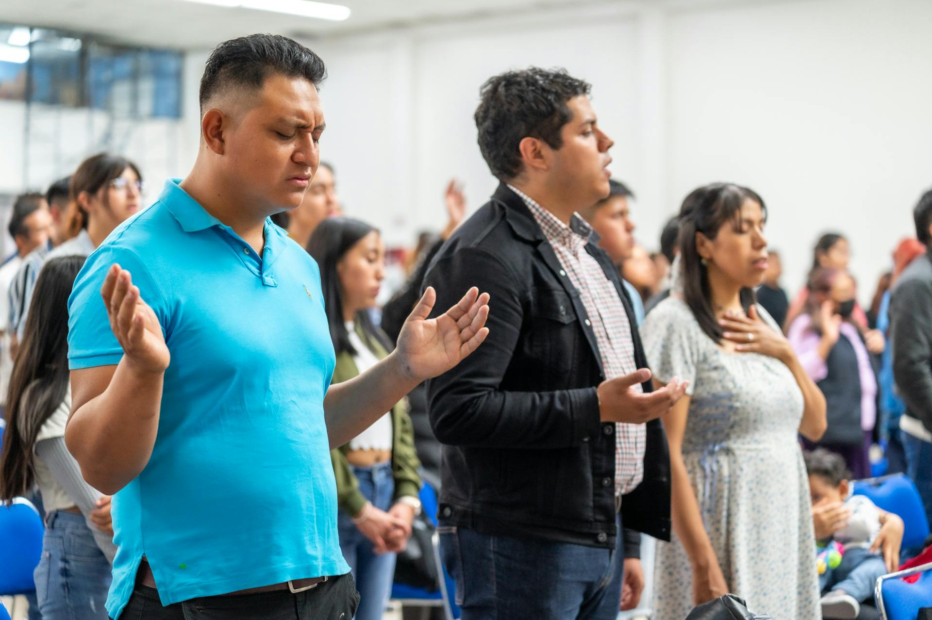 People praying in church | Source: Pexels