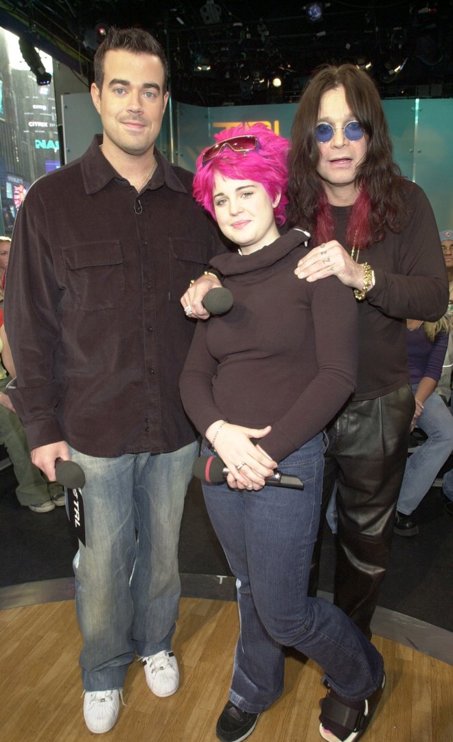 Carson Daly, Kelly Osbourne, and Ozzy Osbourne at MTV's Total Request Live on October 18, 2001, in New York City, New York | Source: Getty Images