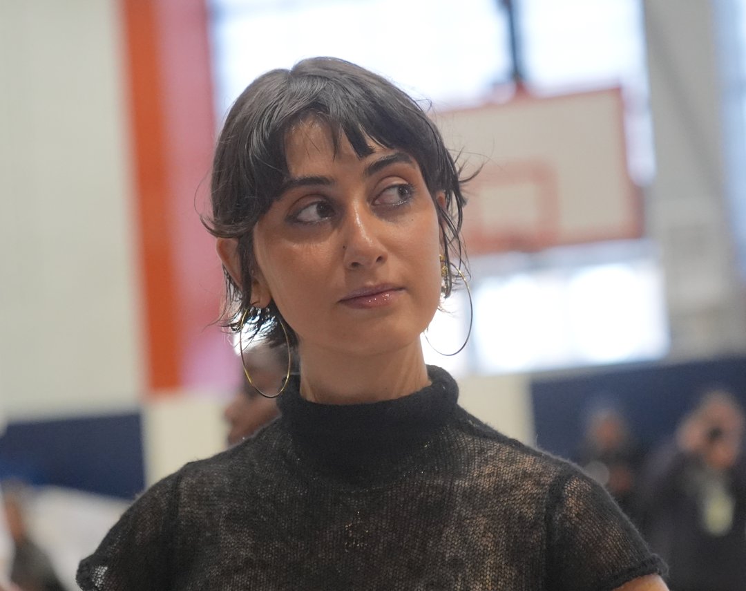 Captured in a candid moment, Rama Duwaji looks off to the side while inside a polling station in Astoria — her expression calm, focused, and reflective on a pivotal Election Day, on November 4, 2025.