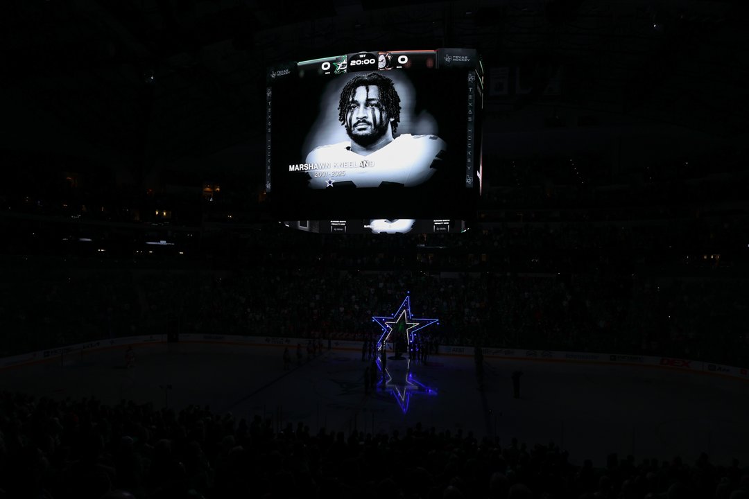 A tribute to Marshawn Kneeland is displayed on the arena screen before the Dallas Stars vs. Anaheim Ducks game in Texas on November 6, 2025 | Source: Getty Images