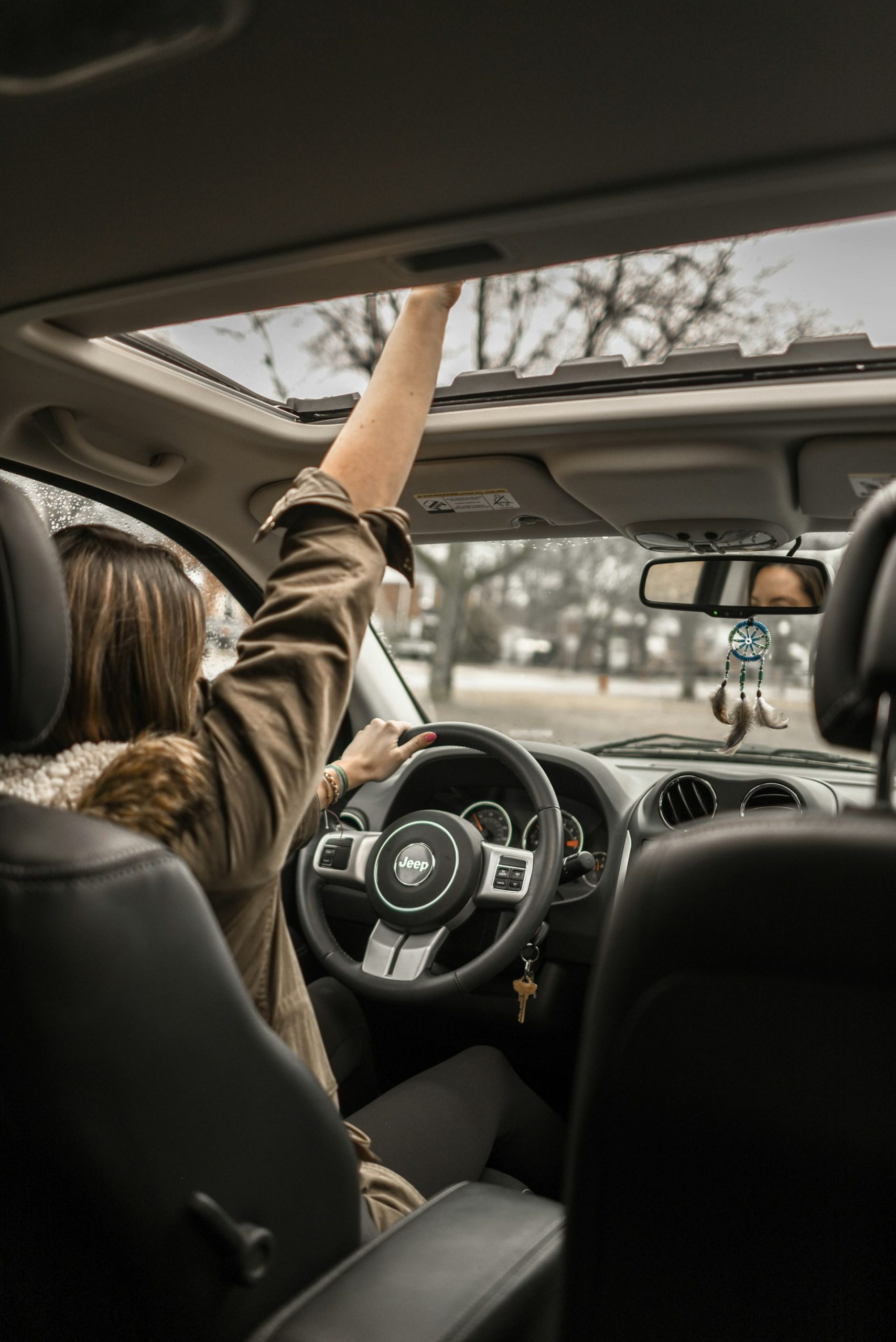 A woman driving her car | Source: Unsplash