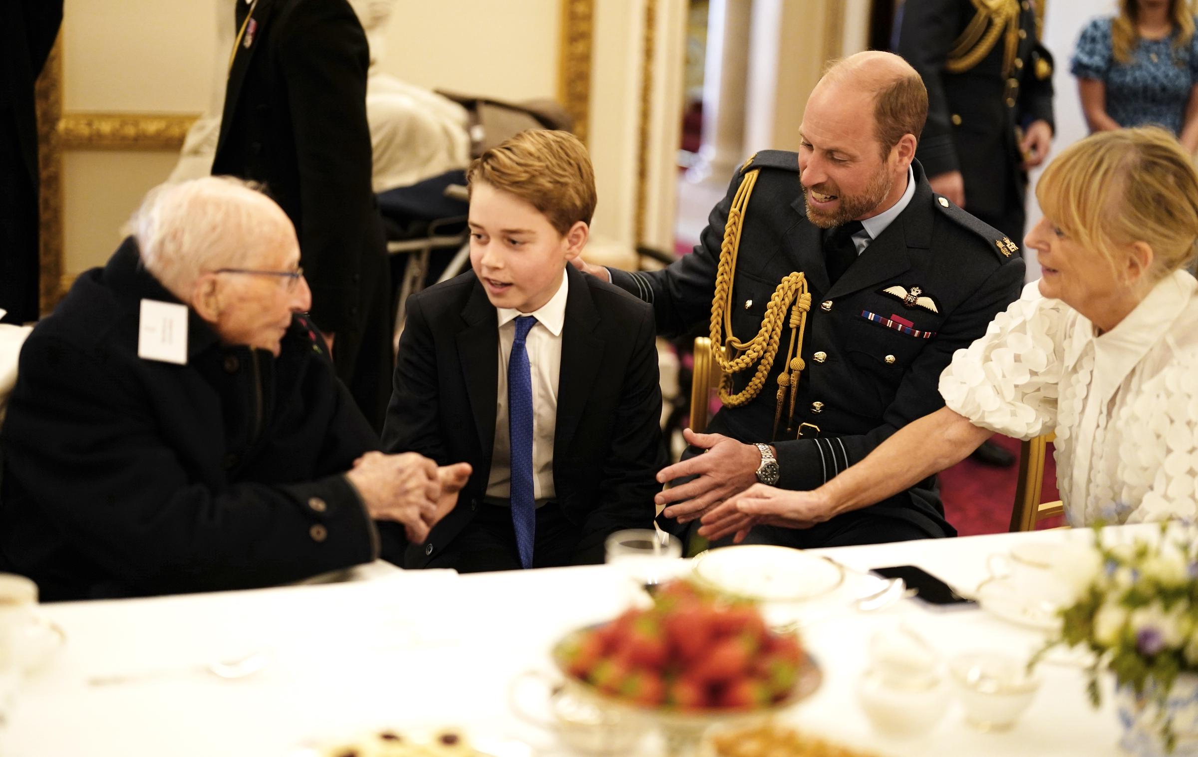 Prince William, Prince of Wales and Prince George join Second World War veterans at a tea party in Buckingham Palace following the military procession to mark the 80th anniversary of VE Day on May 5, 2025 in London, England | Source: Getty Images