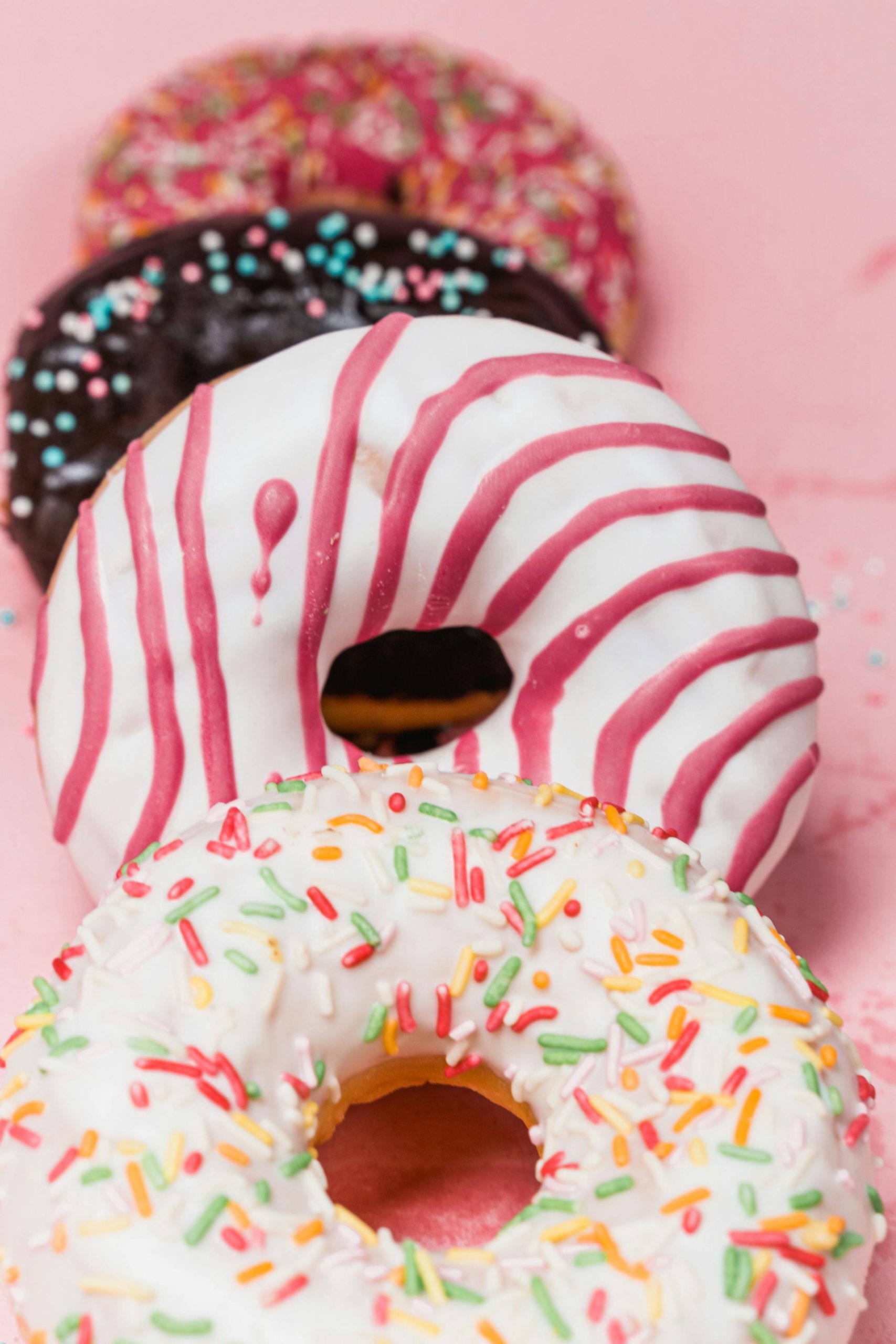 Colorful donuts with sprinkles on the top | Source: Pexels