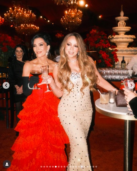 Kris Jenner and Mariah Carey clinking glasses as they pose for the cameras. | Source: Instagram/krisjenner