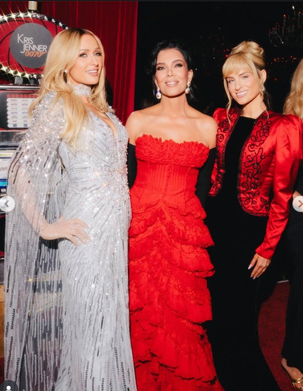 Kri Jenner poses with Paris Hilton and Meghan Trainor during her 70th birthday celebration, dated November 10, 2025 | Source: Instagram/krisjenner