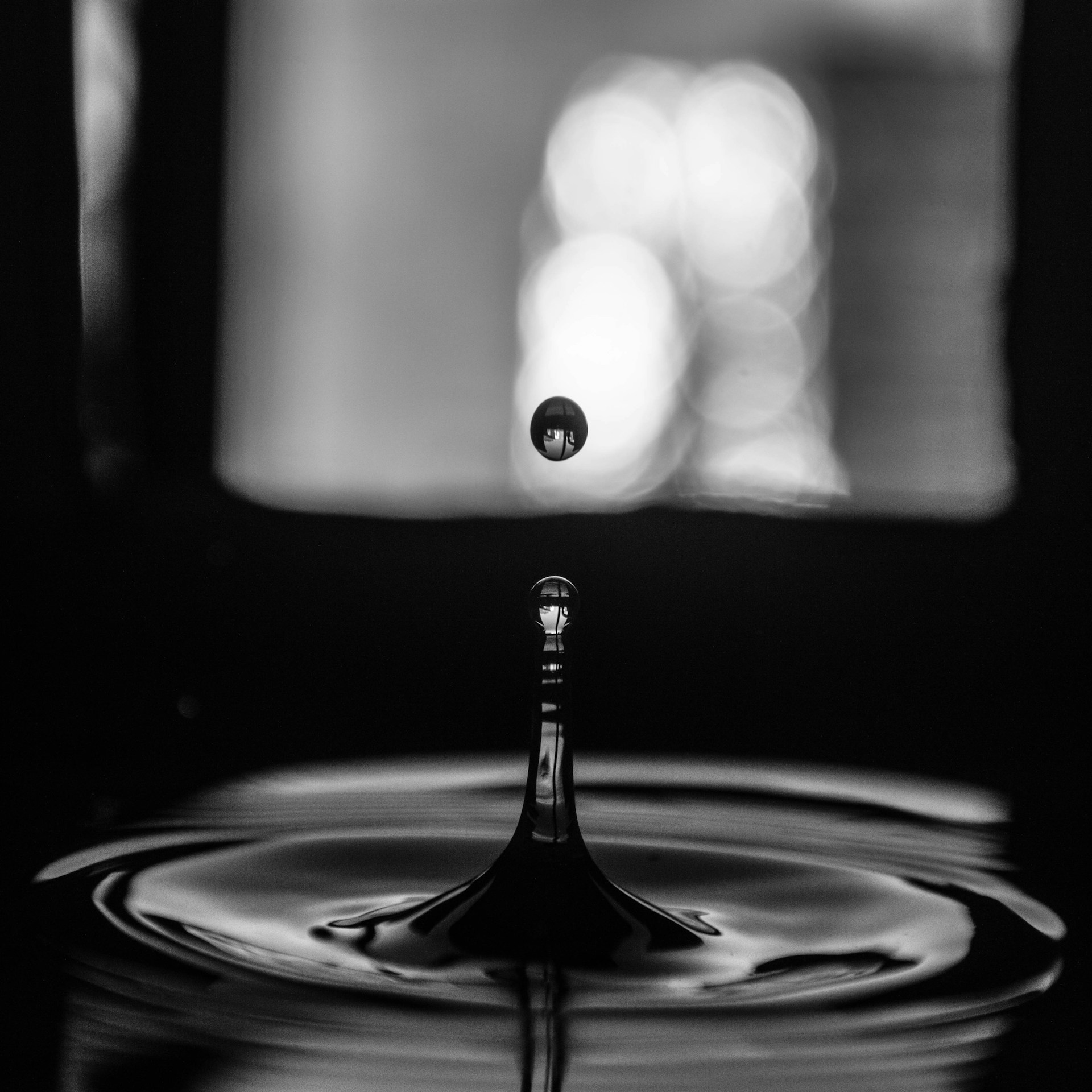 Close-up shot of dripping water | Source: Unsplash