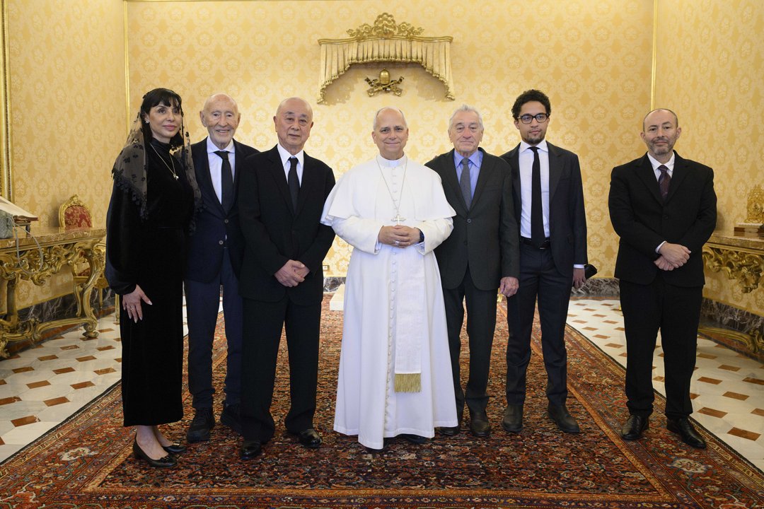 Pope Leo XIV posing with Robert De Niro and others at the Apostolic Palace on November 7, 2025, in Vatican City. | Source: Getty Images